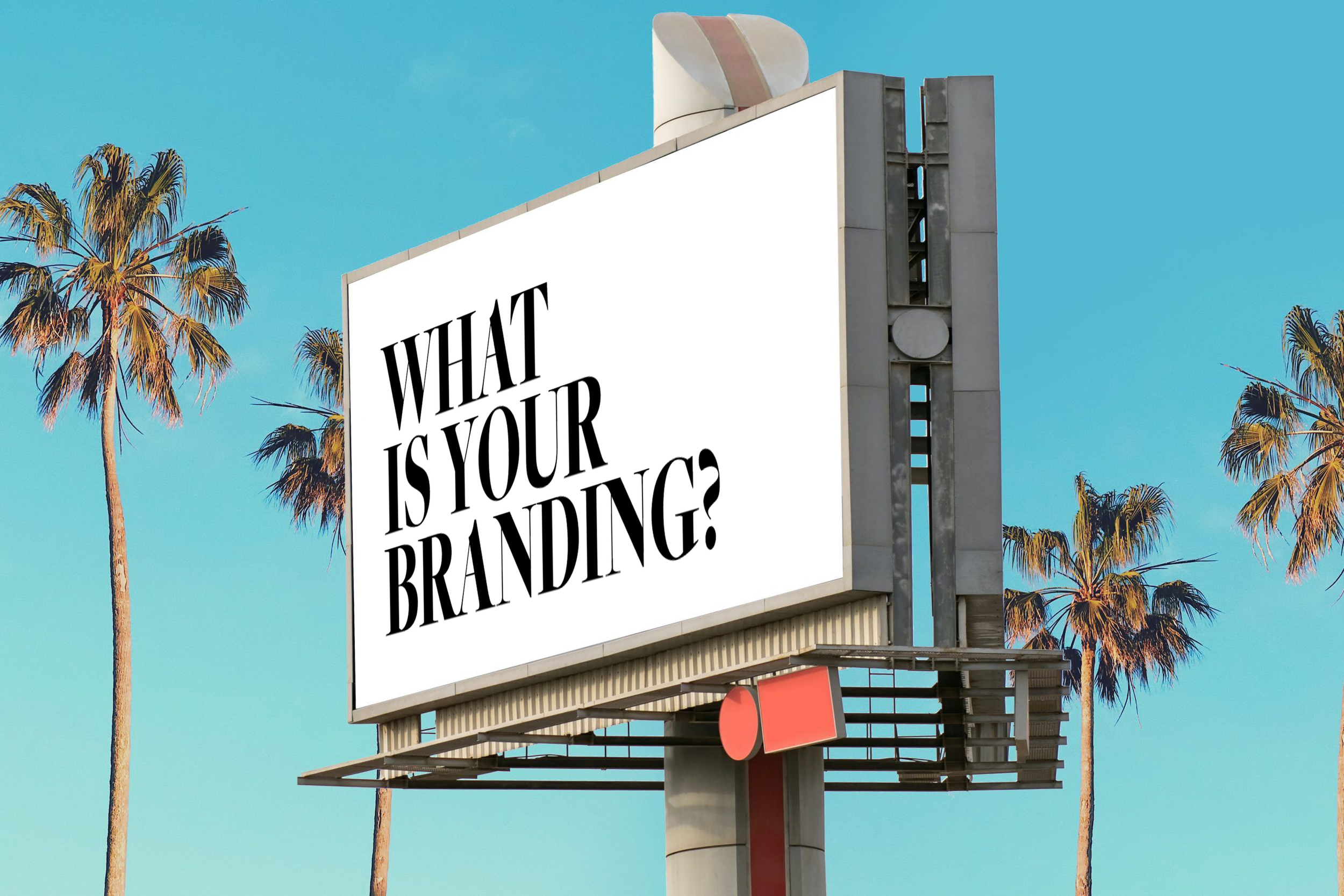 A billboard with the text 'WHAT IS YOUR BRAND?' against a blue sky with palm trees.