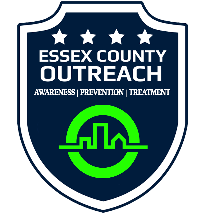 Badge for Essex County Outreach, featuring four stars at the top, the organization name in bold, and the words 'Awareness, Prevention, Treatment' below. It has a green circular logo with a city skyline inside.