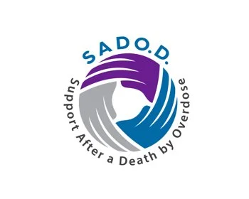 Logo with the text "SADO.D" and a circular design of three hands in purple, blue, and gray colors, representing support after a death by overdose.