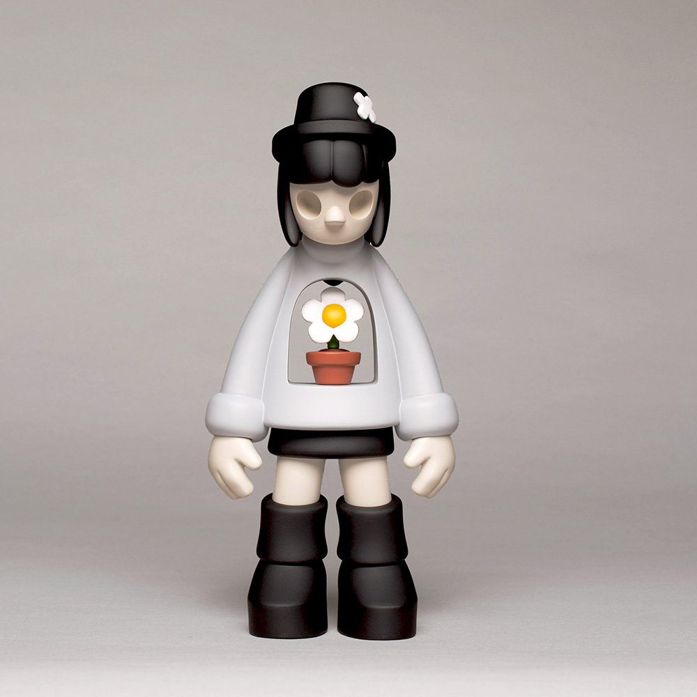 Miss Bliss limited edition designer art toy in grey, front profile view, emphasizing the smooth resin design and fine details, part of the Exploration of Void series