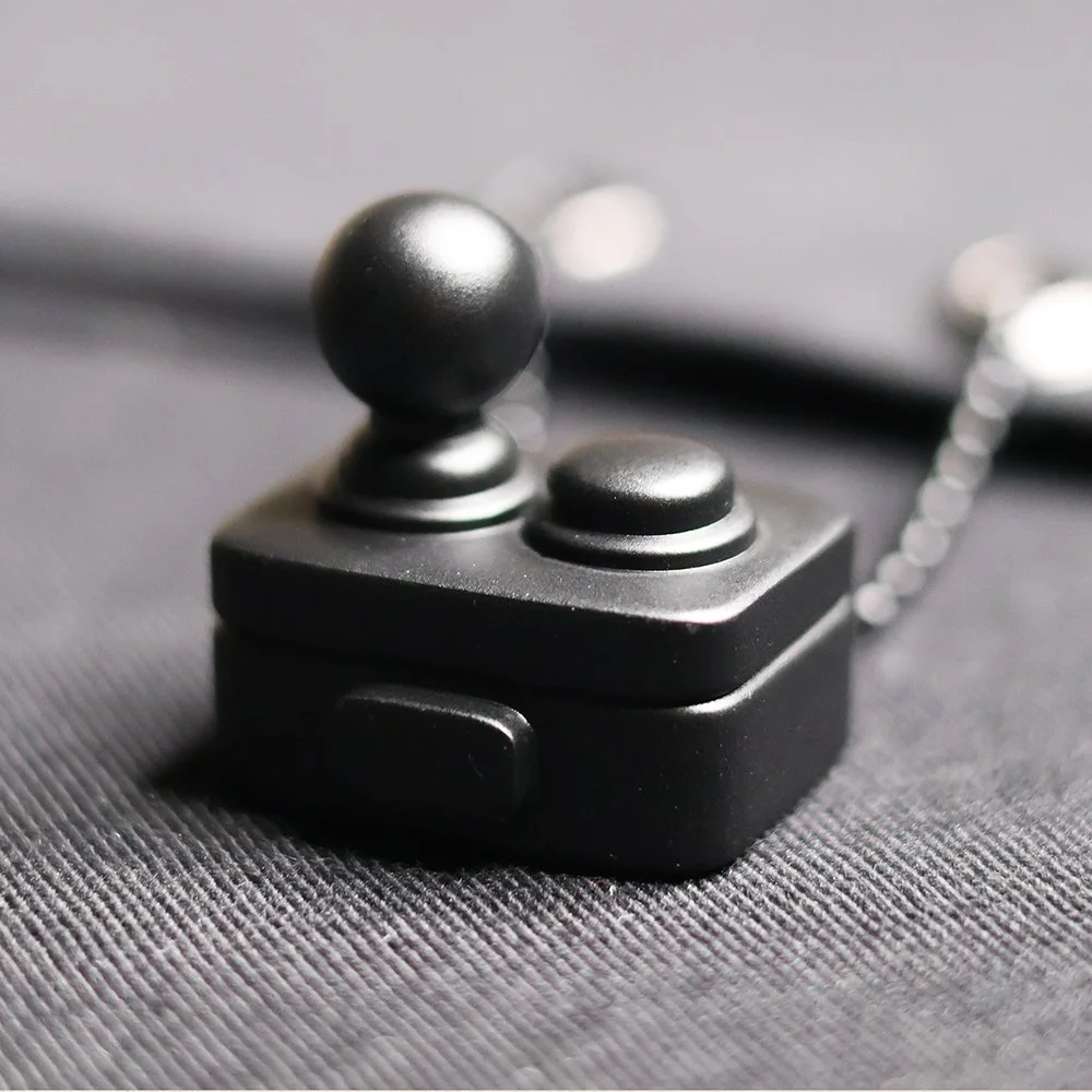 atom-x-steezy-designer-art-black-Escape⁴-t-shirt-collectible-art=toy-close-up.jpg