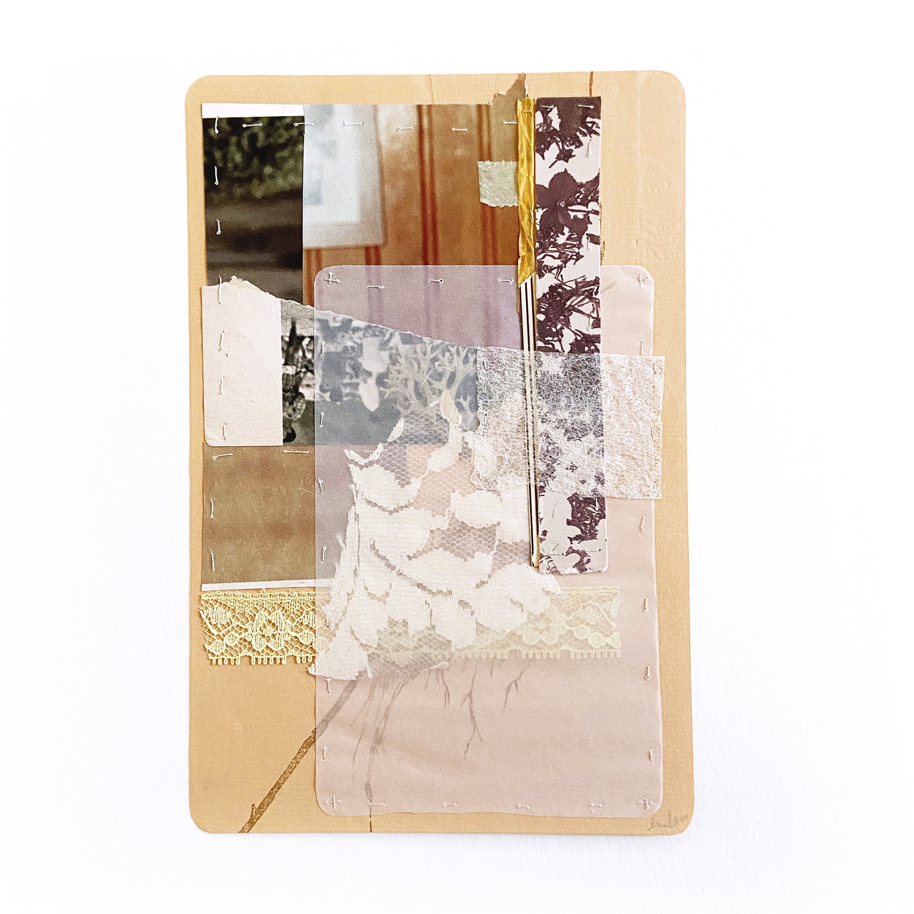 Warm abstract collage art resembling a nest
