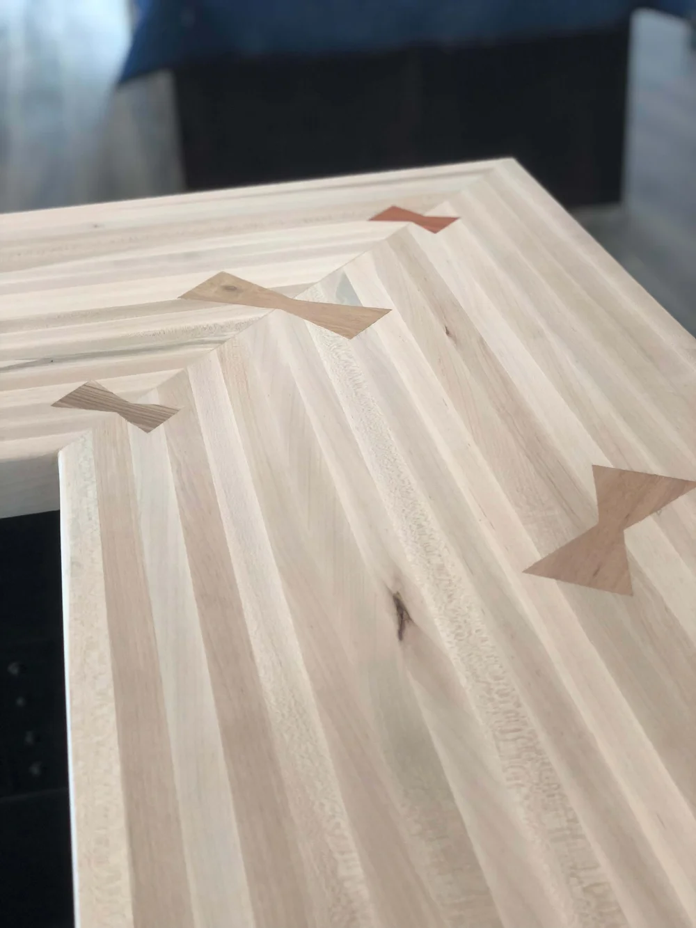 Butterfly inlay joints in a custom wood countertop built by Bergeson Construction
