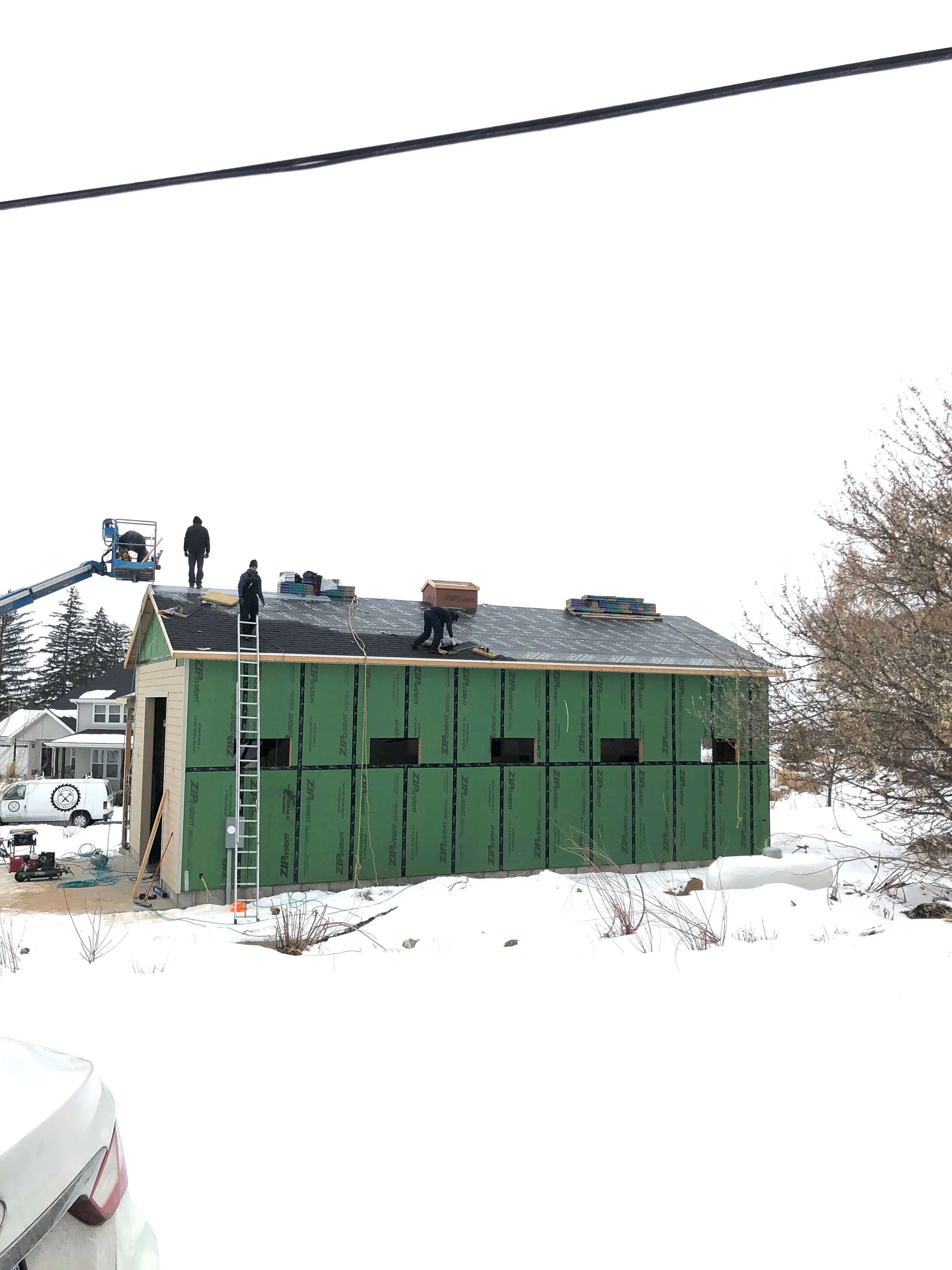 Bergeson Construction crew framing a custom home in Cache Valley, Utah