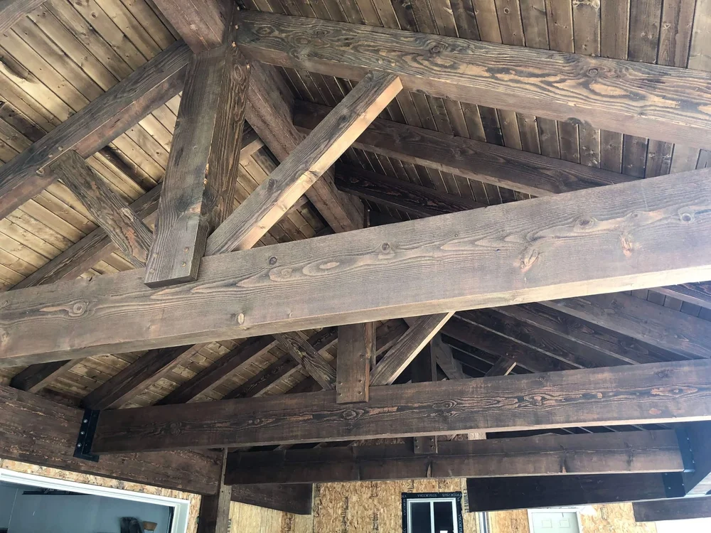 Exposed timber roof trusses in a Bergeson Construction custom home