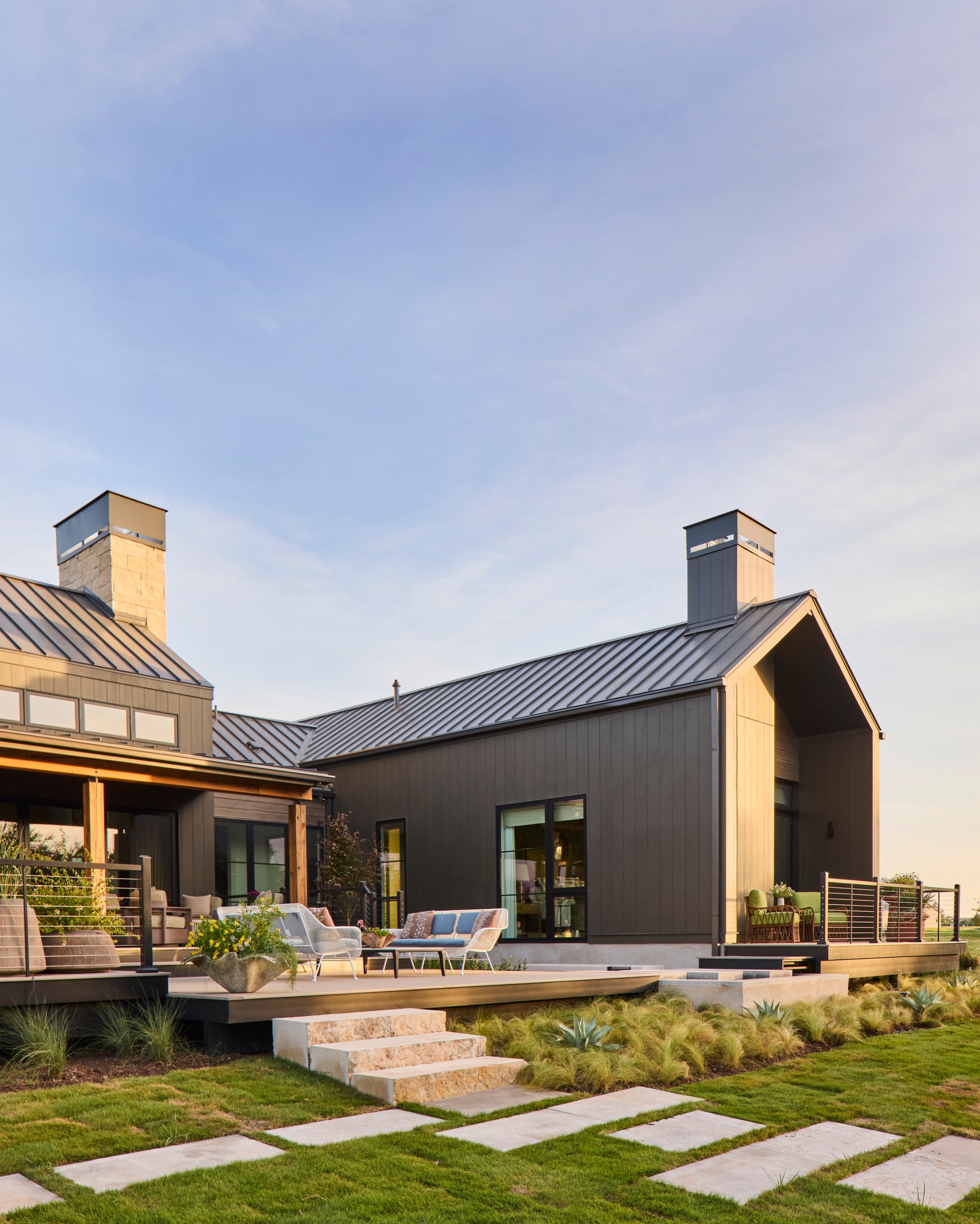 Landscape and architecture as one composition.

At the 2026 @southernlivingmag Idea House, the landscape was designed to respond to both the architecture and the Hill Country beyond it. Native and adapted planting softens the geometry of the house, w