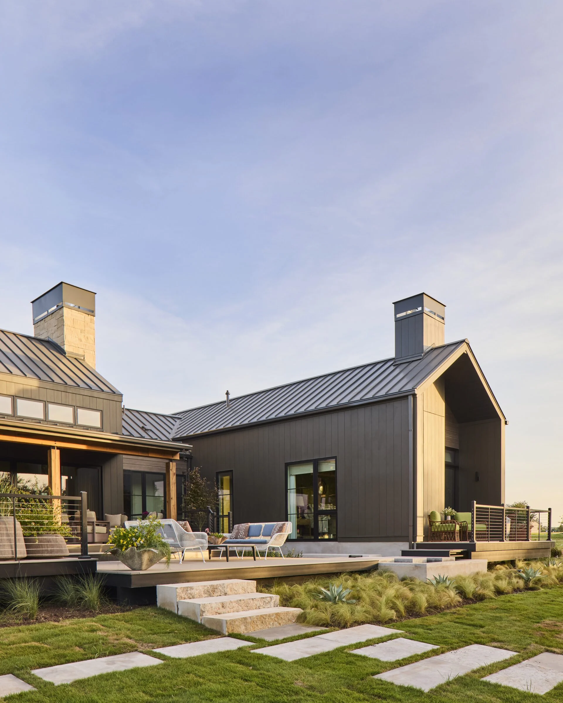 Facade detail with windows and landscape planting, Southern Living Idea House Fredericksburg landscape design by Melissa Gerstle Design.