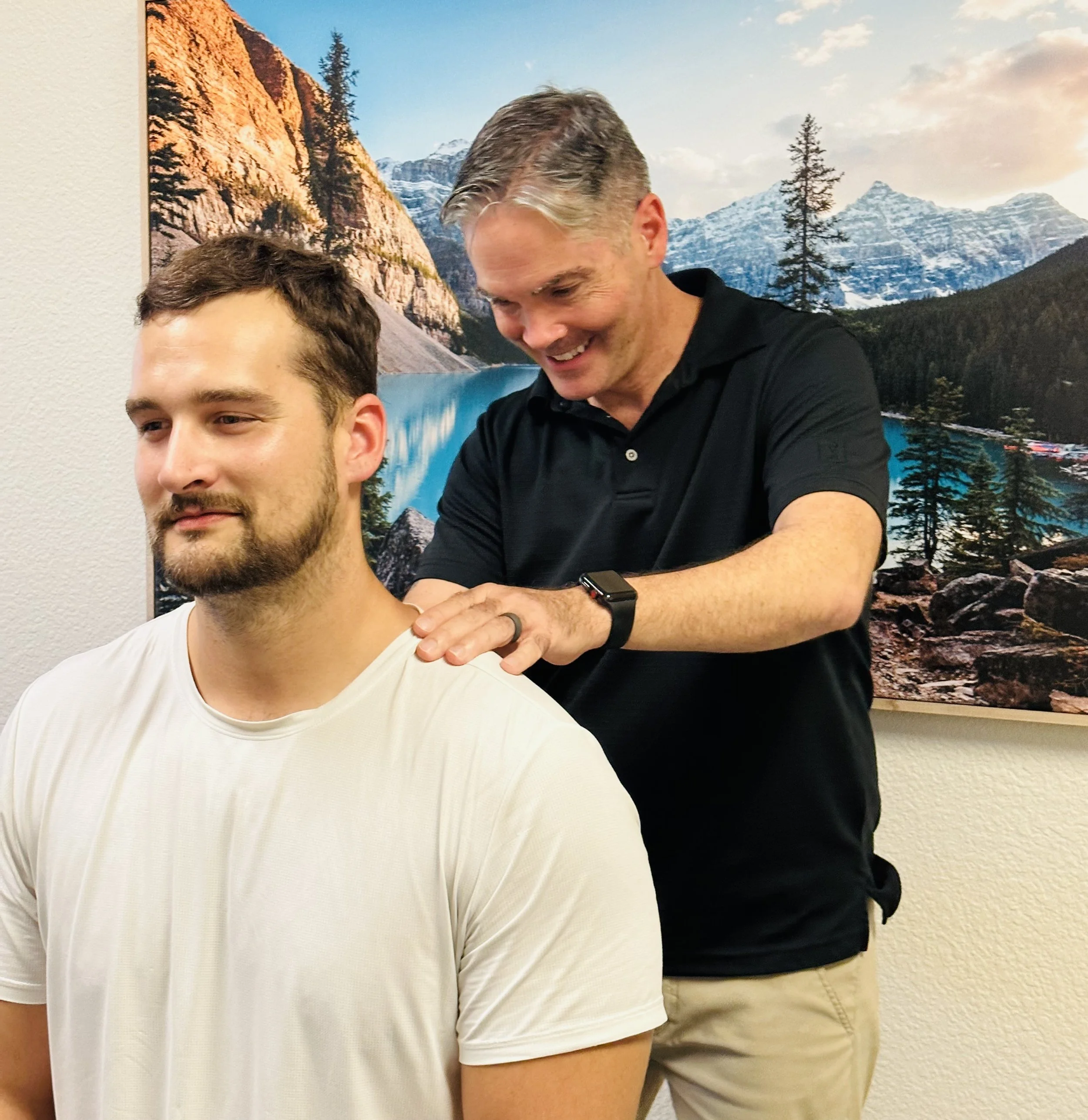 Chiropractor, Jeff Keon, working on man's back and spine. Relief for back pain in Sacramento, CA