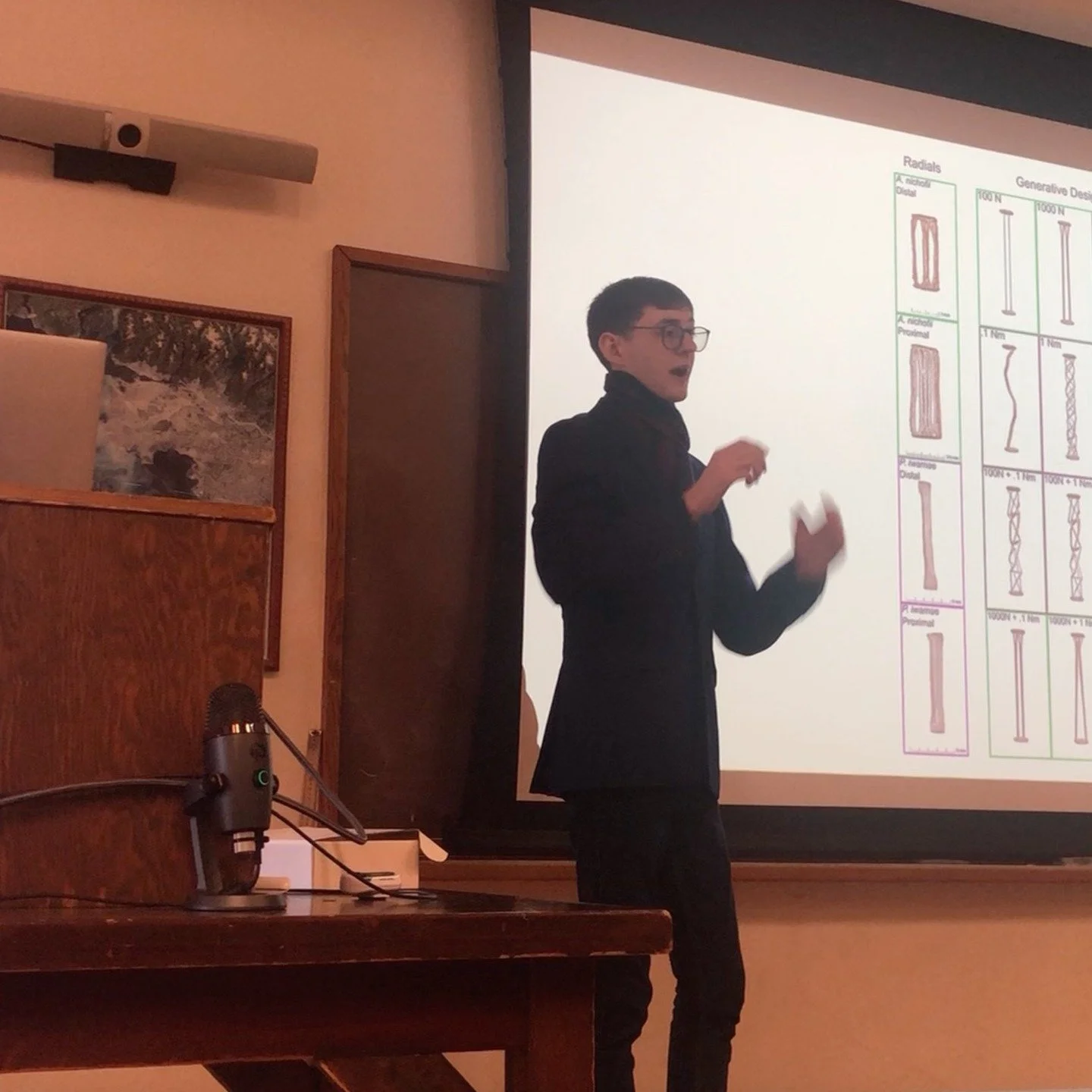 John presenting his work on "Sinusoidally Swimming Synthetic Stingray Skeletons". Say that three times fast!