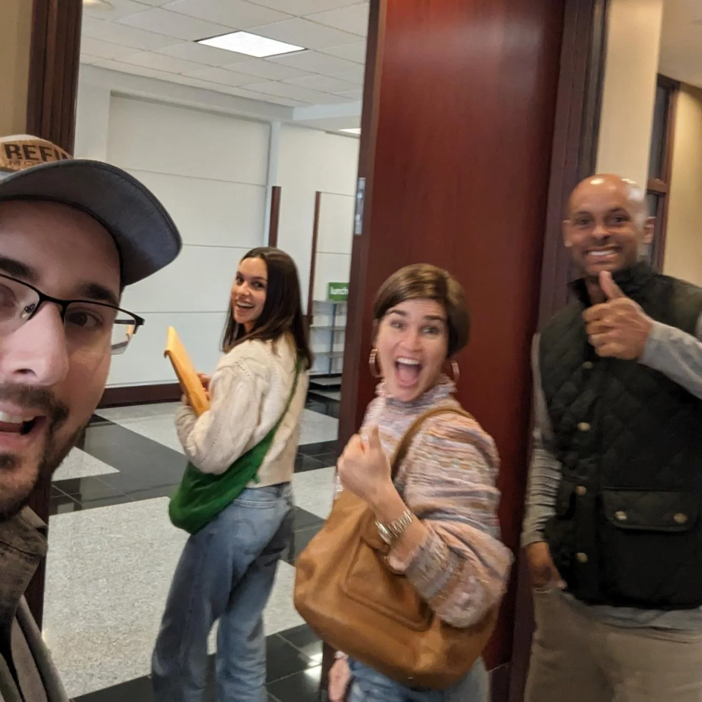 First-time homebuyer celebrating closing day with Realtor Bettina Rappaport