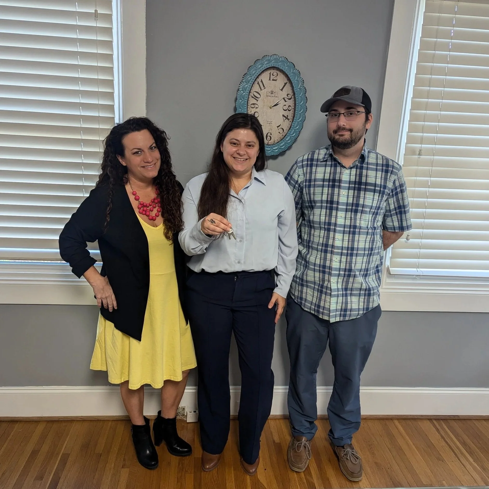 First-time homebuyer celebrating closing day with Realtor Ashley Calla