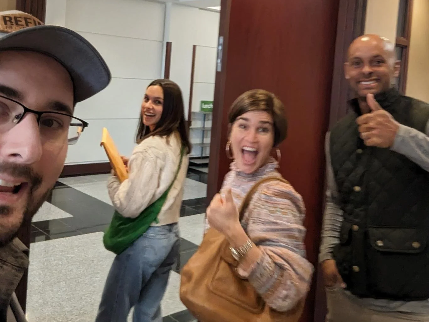 First-time homebuyers celebrating after closing on their new home with Carolina Home Financing.