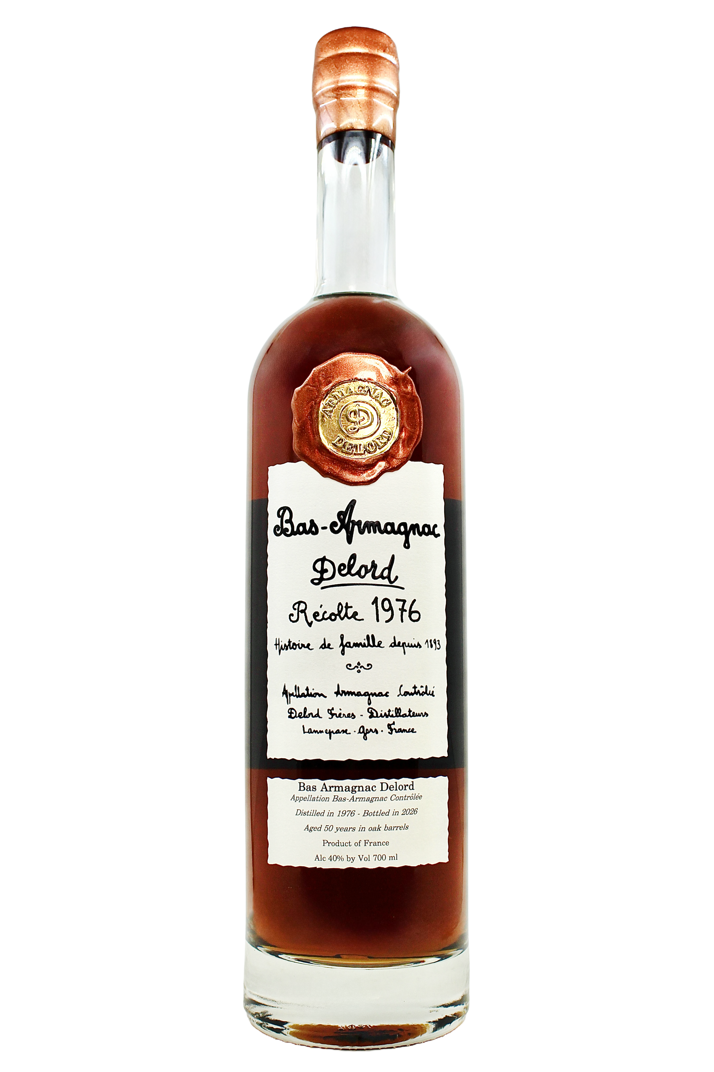 Close up on Delord Bas Armagnac 1976 vintage with an antique hand-written style label and copper wax seal.