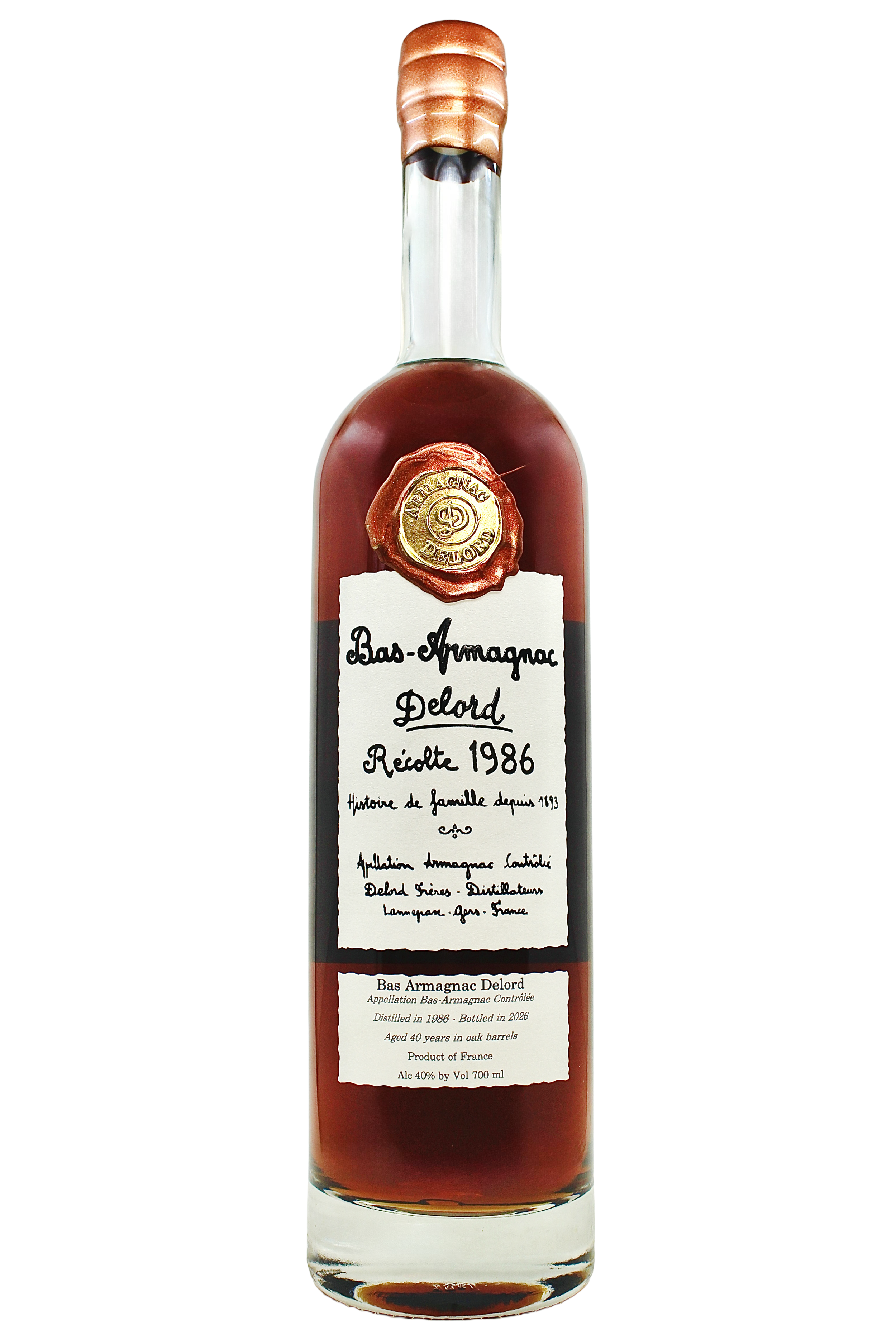 Close up on Delord Bas Armagnac 1986 vintage with an antique hand-written style label and copper wax seal.