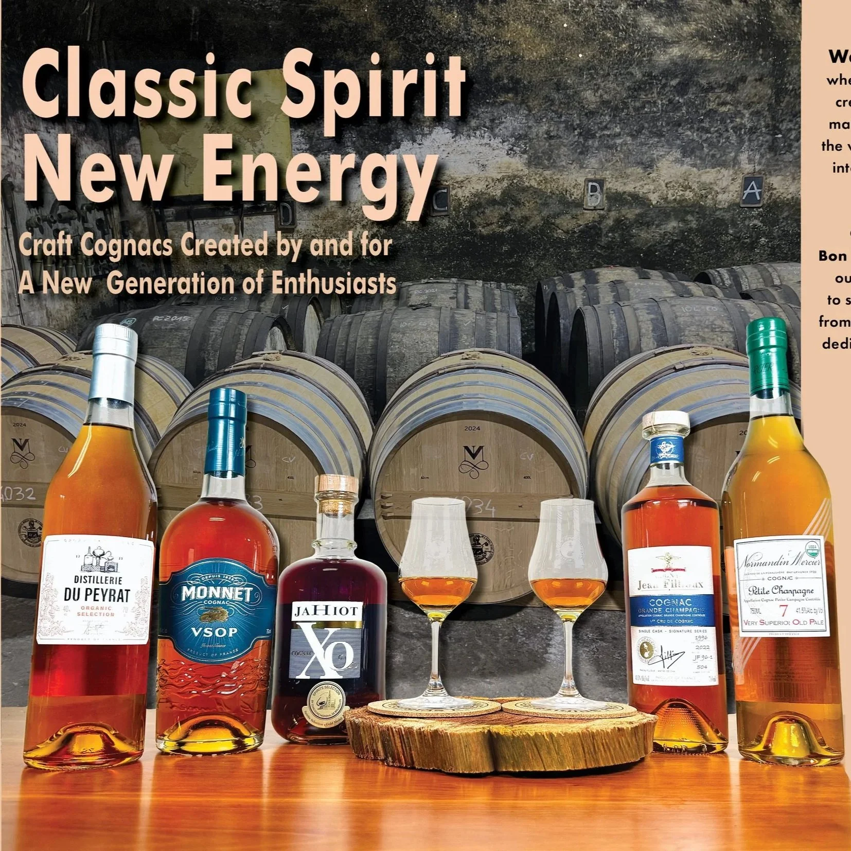 Collection of Cognac bottles from Distillerie du Peyrat, Monnet, Jahiot, Jean Fillioux and Normandin-Mercier on a wooden table with two tulip glasses with amber liquid in front of a cellar full of Cognac barrels.