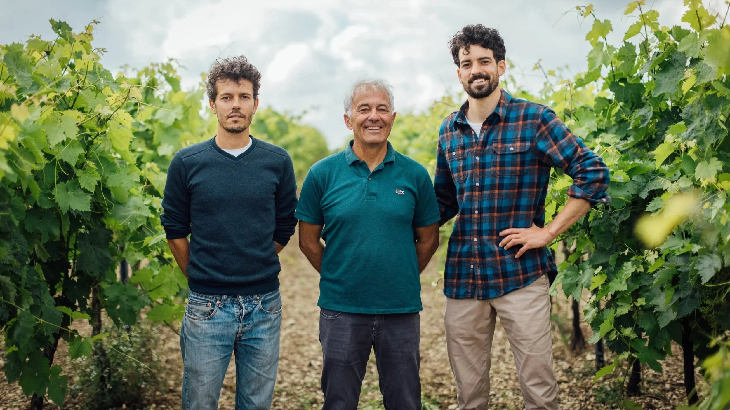 Guillaume, Jean-Francois, and Antoine Rault in their organic family vineyards at Distillerie du Peyrat.