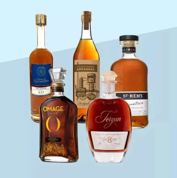 5 Brandy Bottles on a Light Blue background