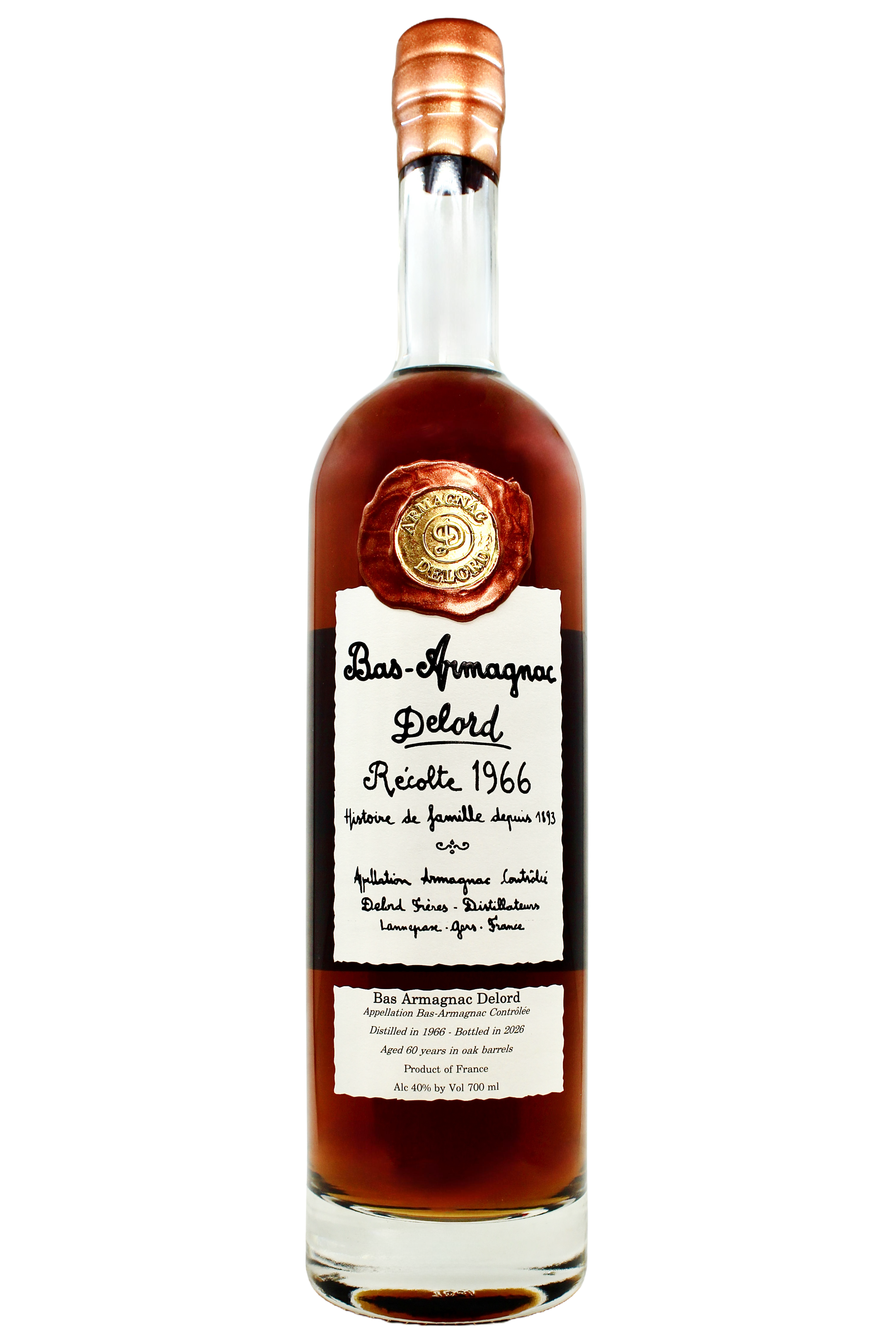 Close up on Delord Bas Armagnac 1966 vintage with an antique hand-written style label and copper wax seal.