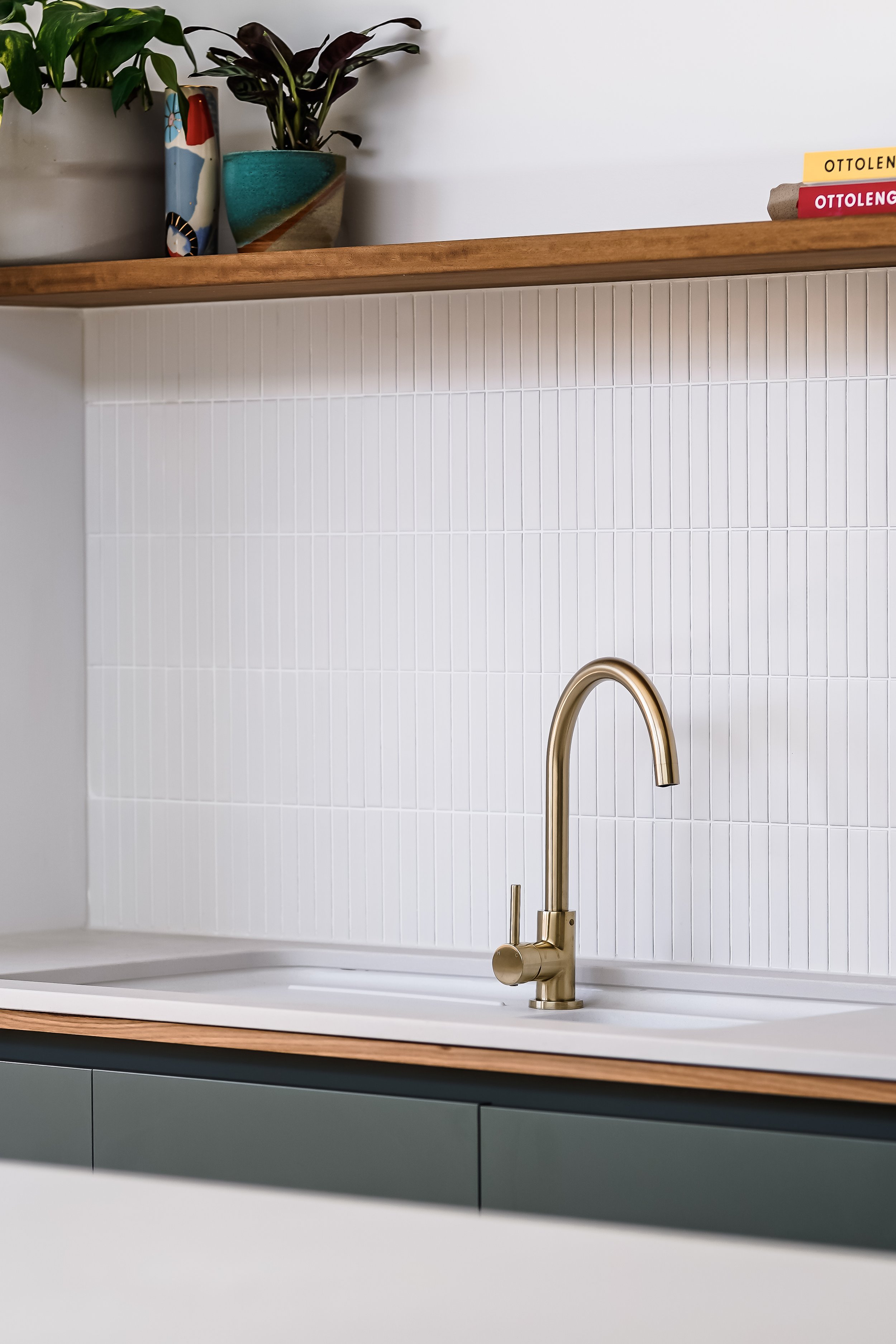 kitchen design in melbourne, white walls, white lavatory, bronze faucet
