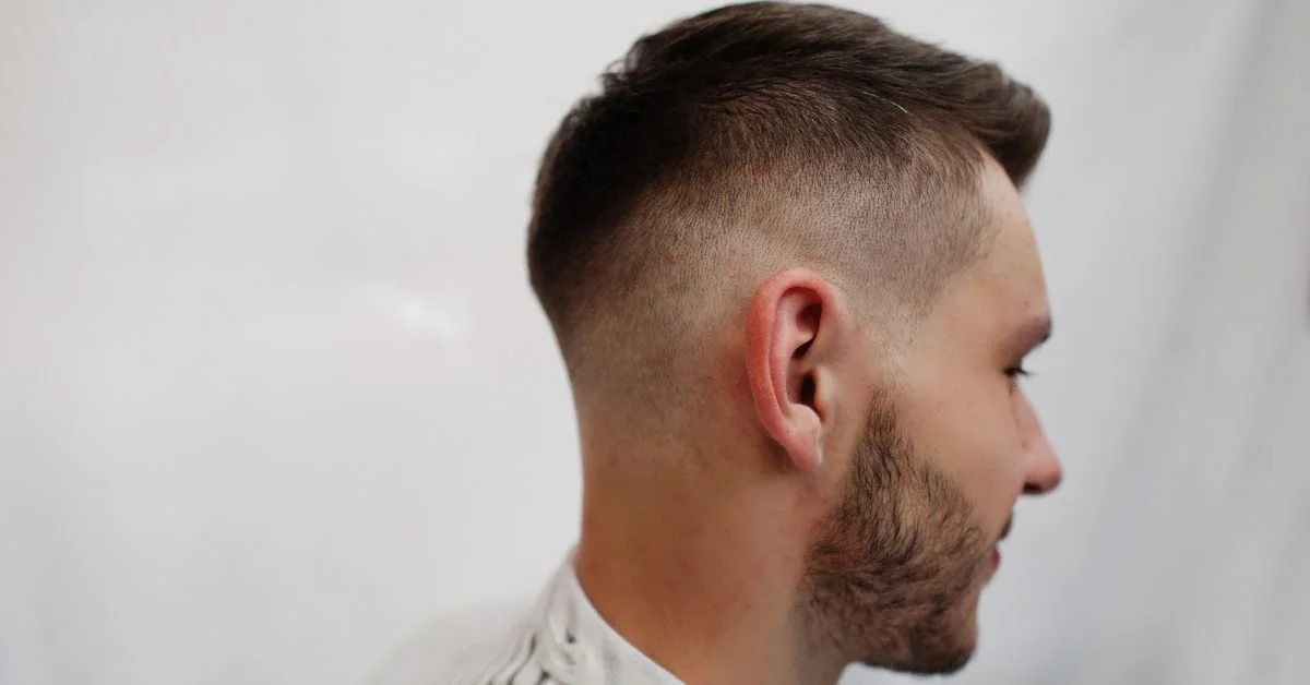 Men's fade haircut example at The Roost barbershop.