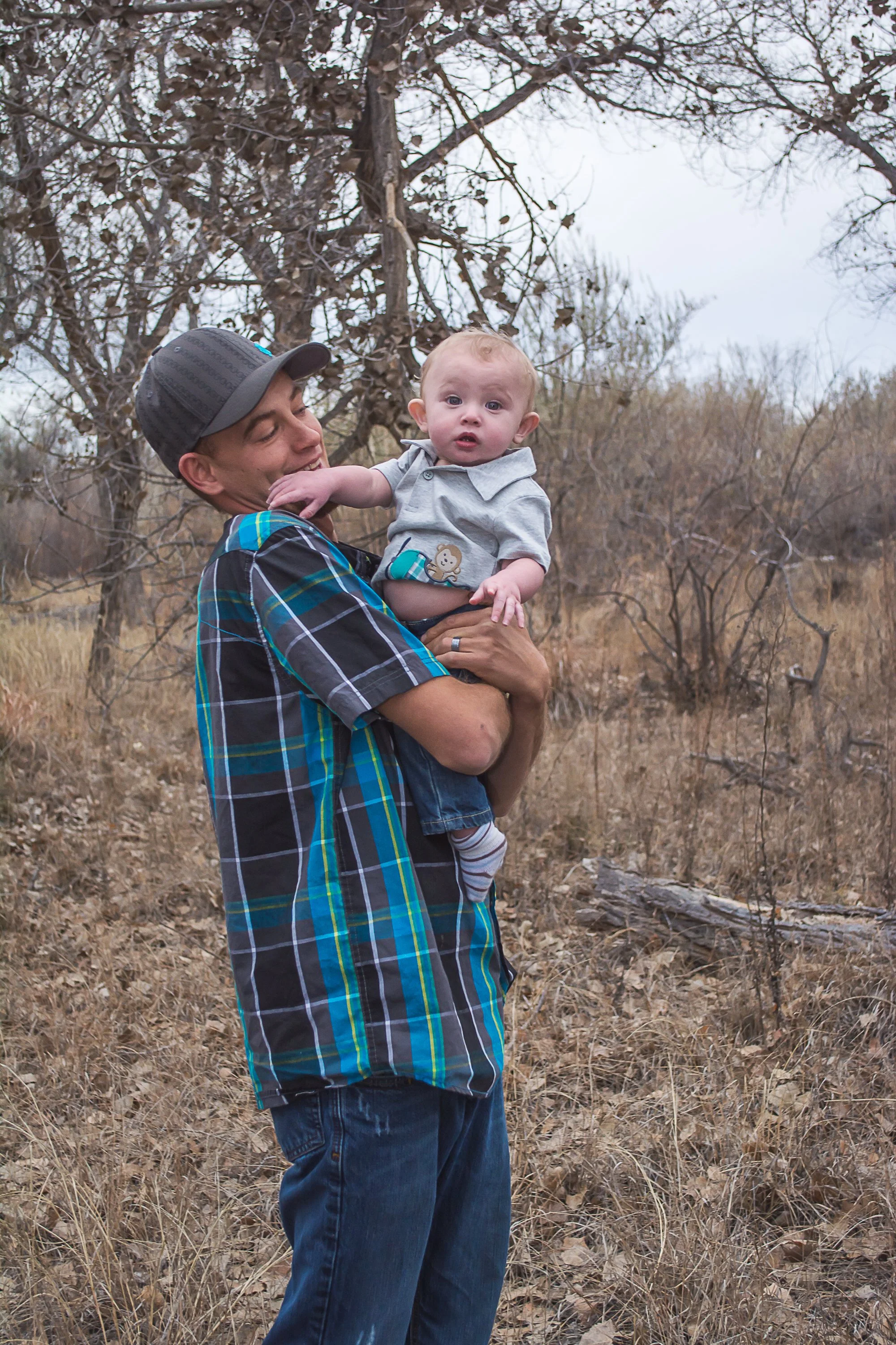 Dad and baby boy during Los Lunas River Park Family Photo Session