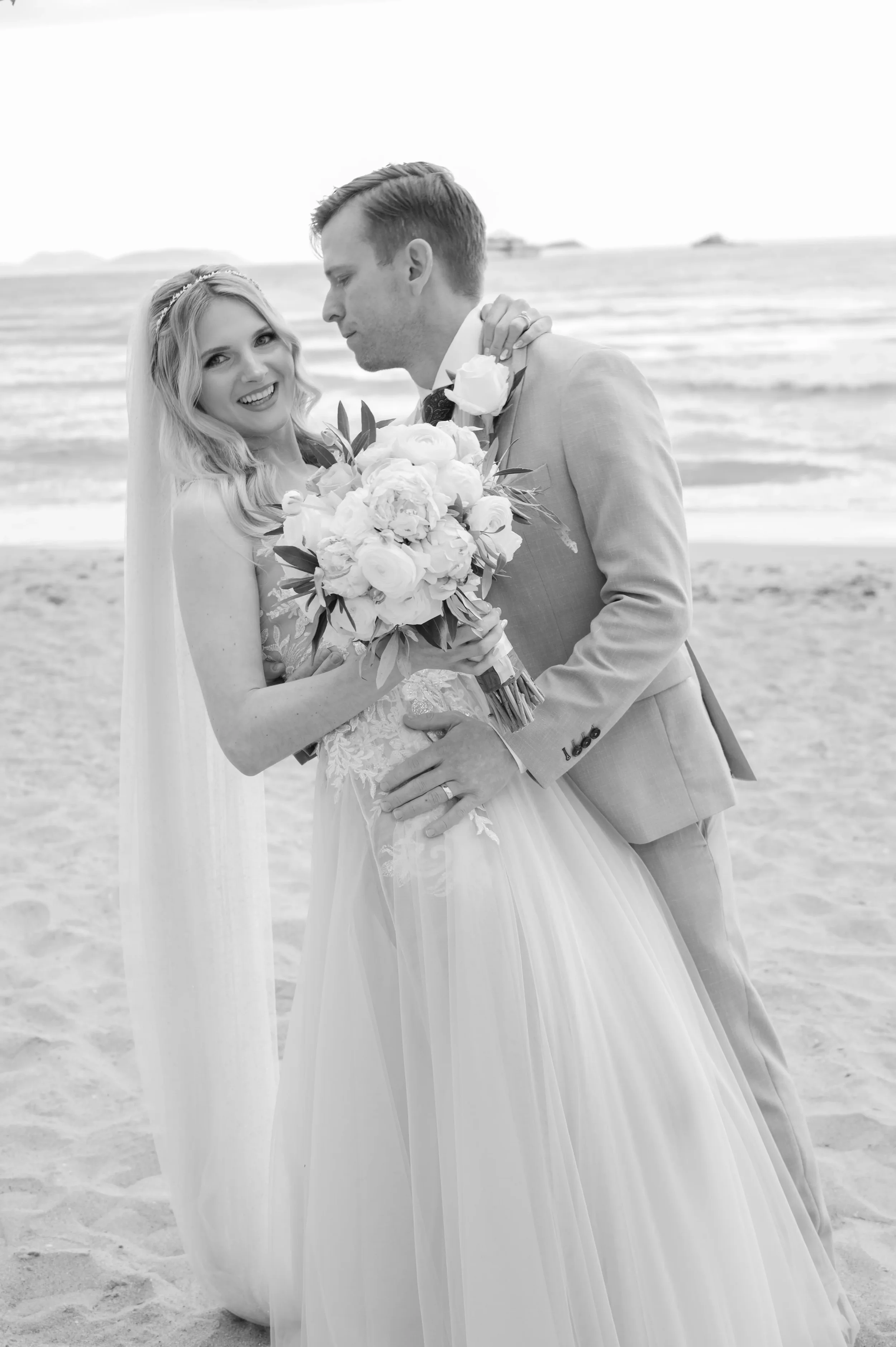 bride-and-groom-by-the-sea.webp