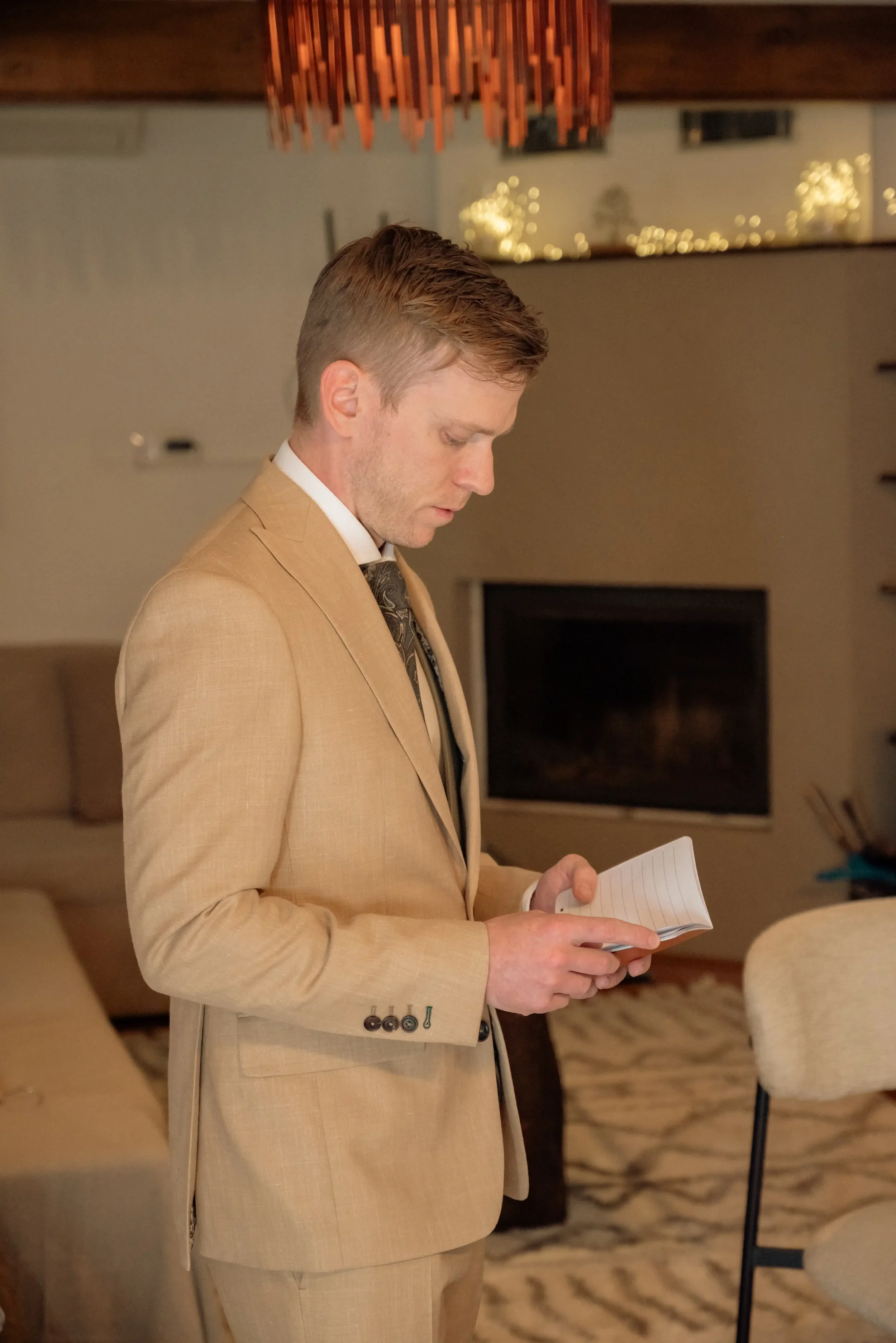 groom-reading-his-vows.webp