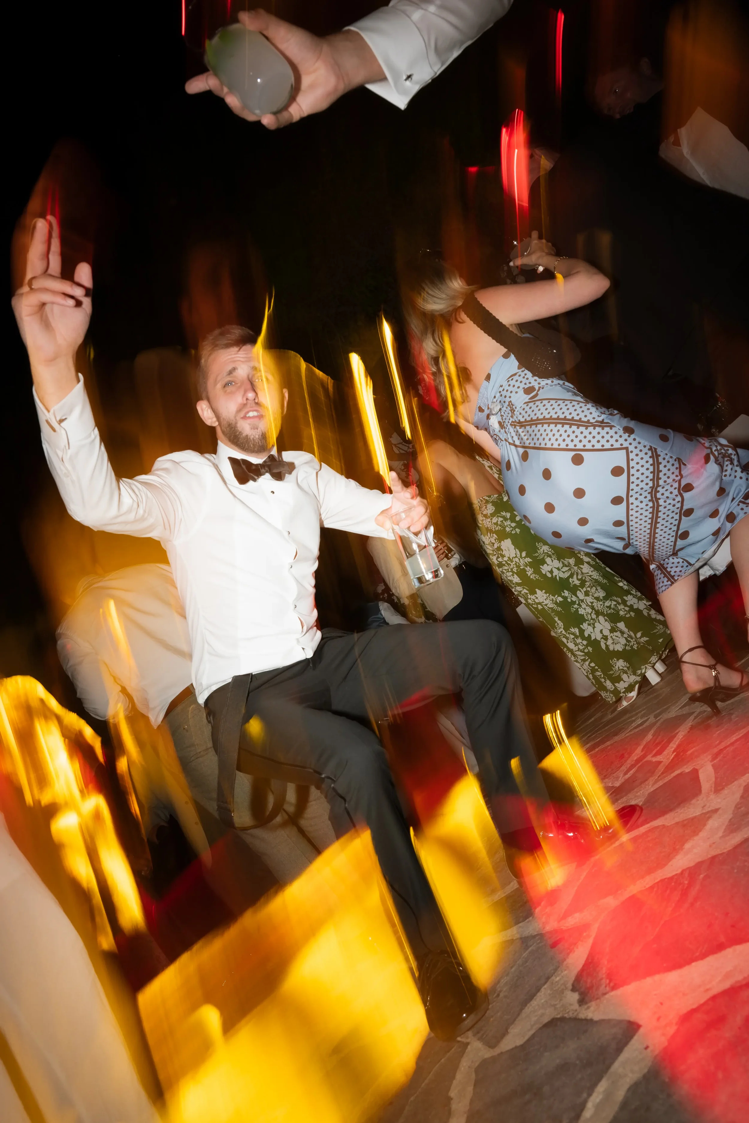 groomsman-dancing-at-a-destination-wedding-in-the-athenian-riviera.webp