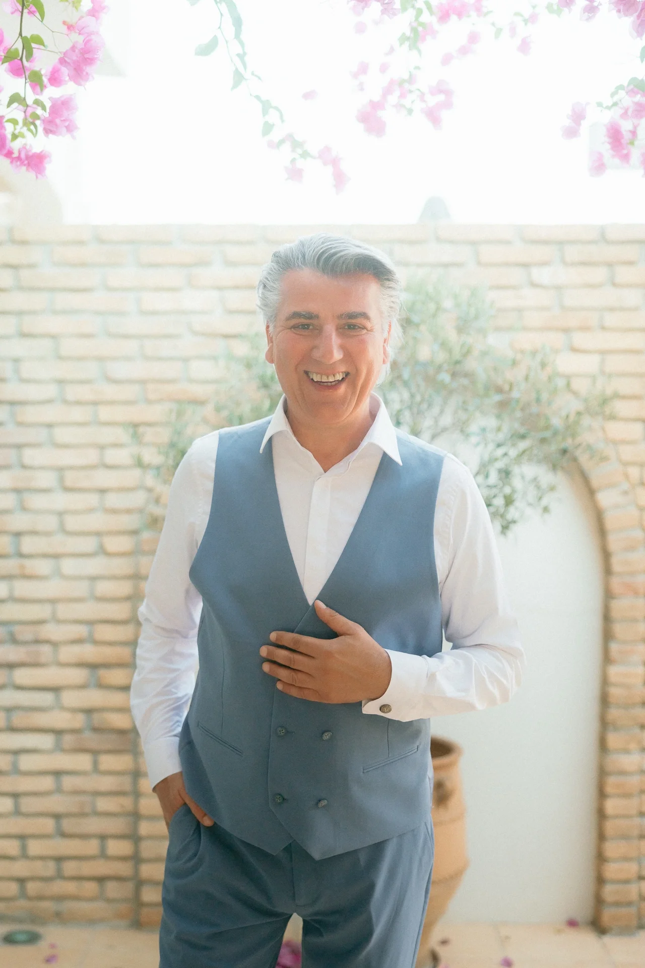 groom-smiling-at-the-camera.webp