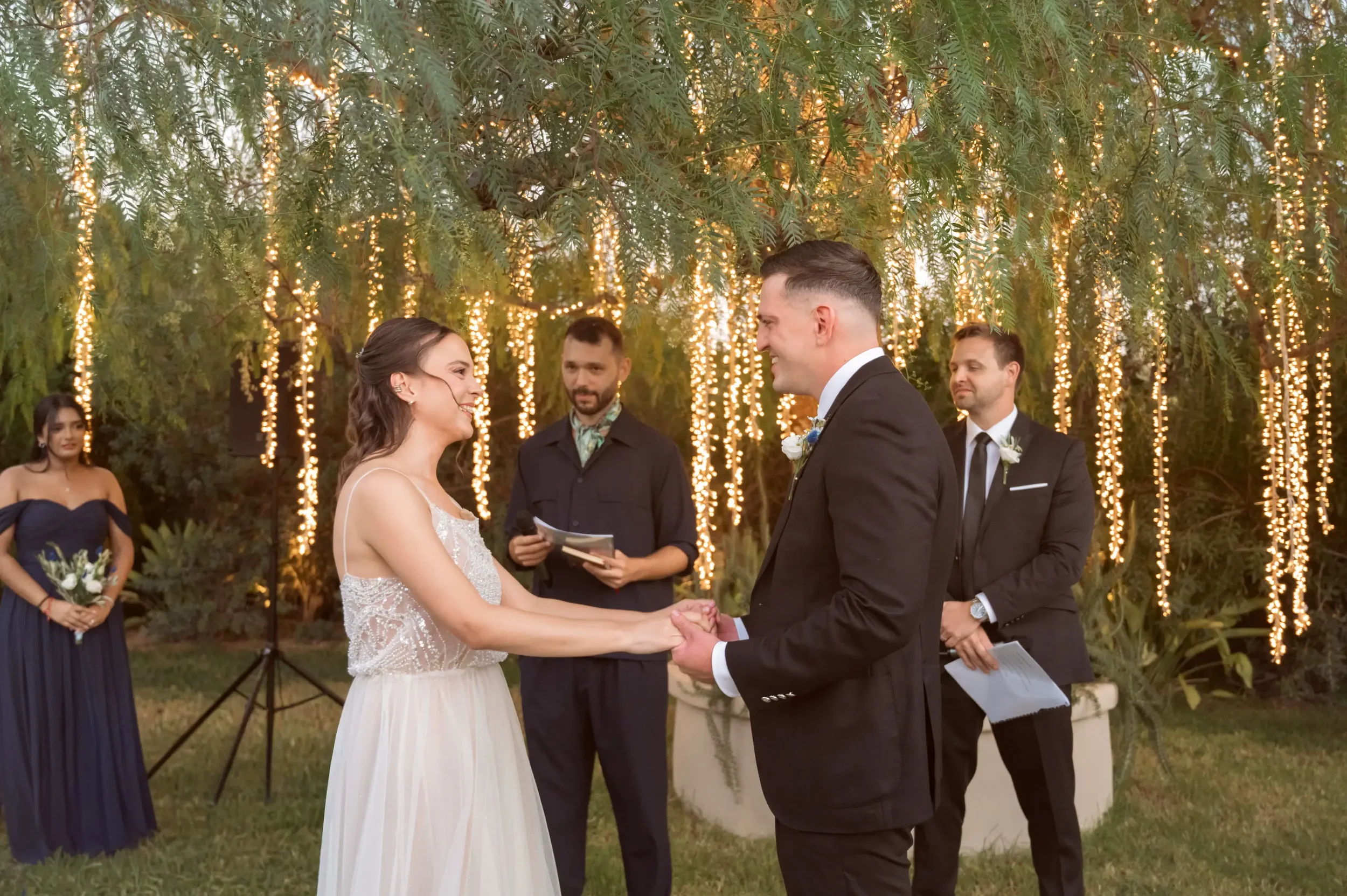 bride and groom exchanging vows at their destination wedding