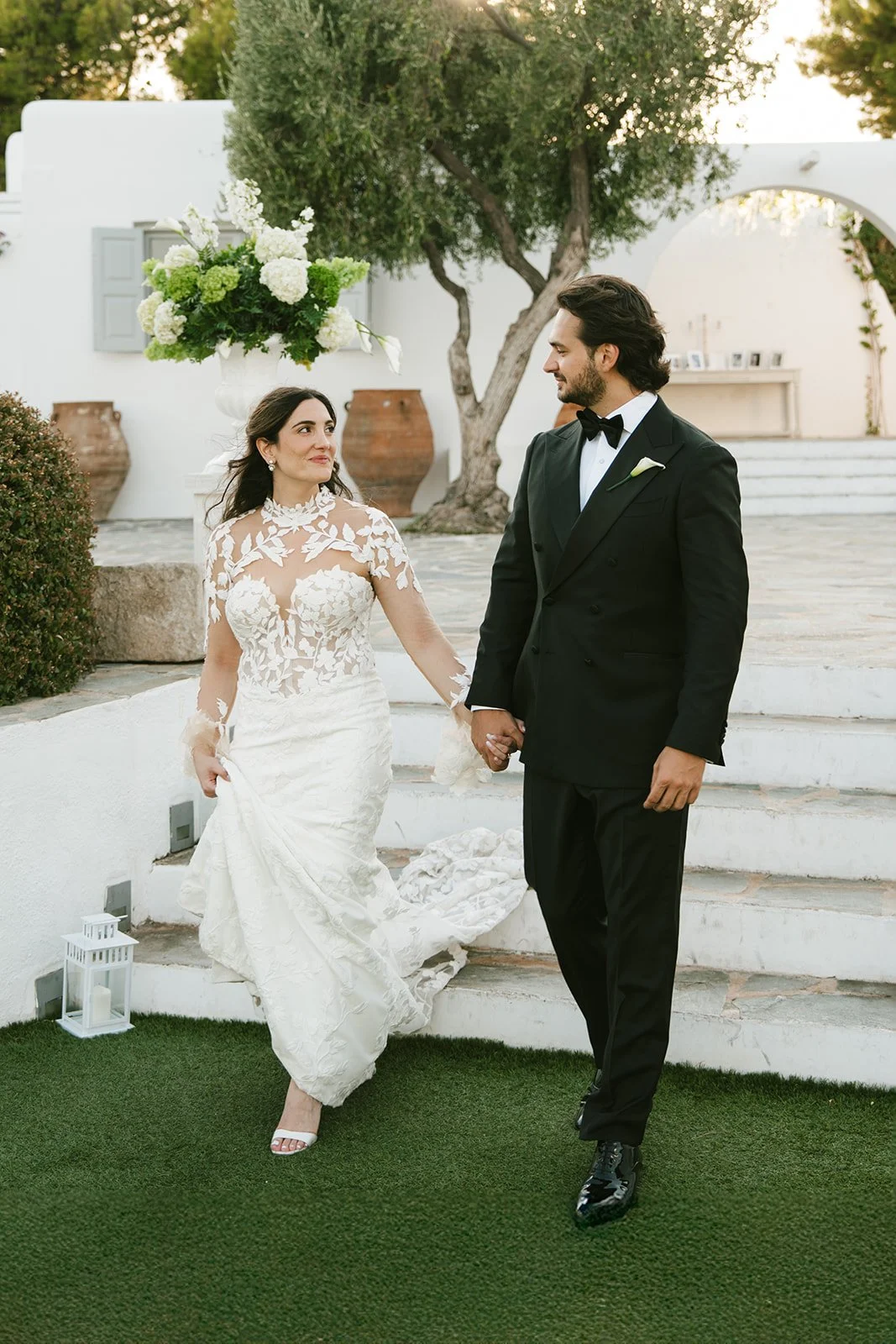 bride and groom entering wedding reception