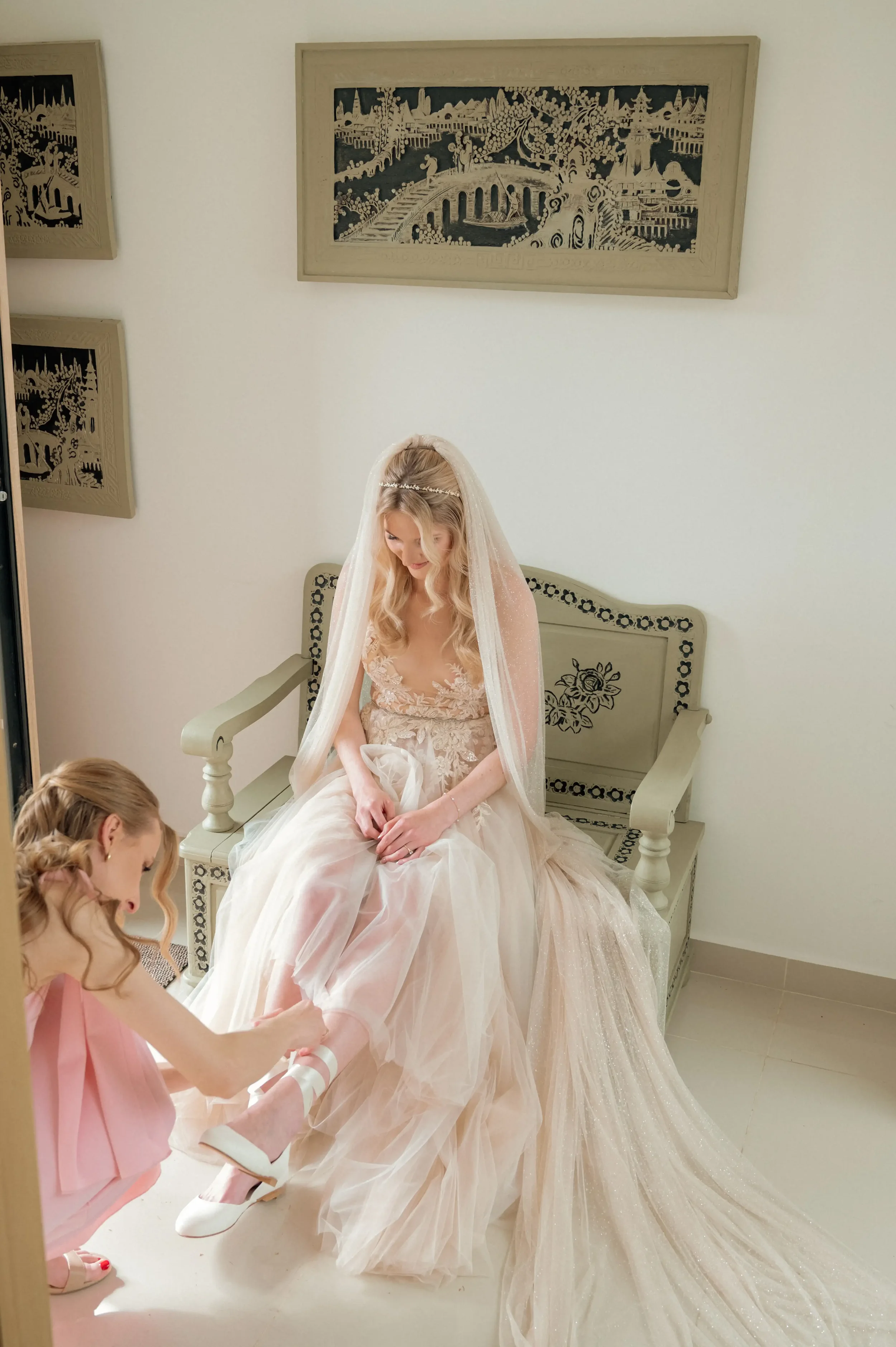 a-bride-getting-her-shoes-on.webp
