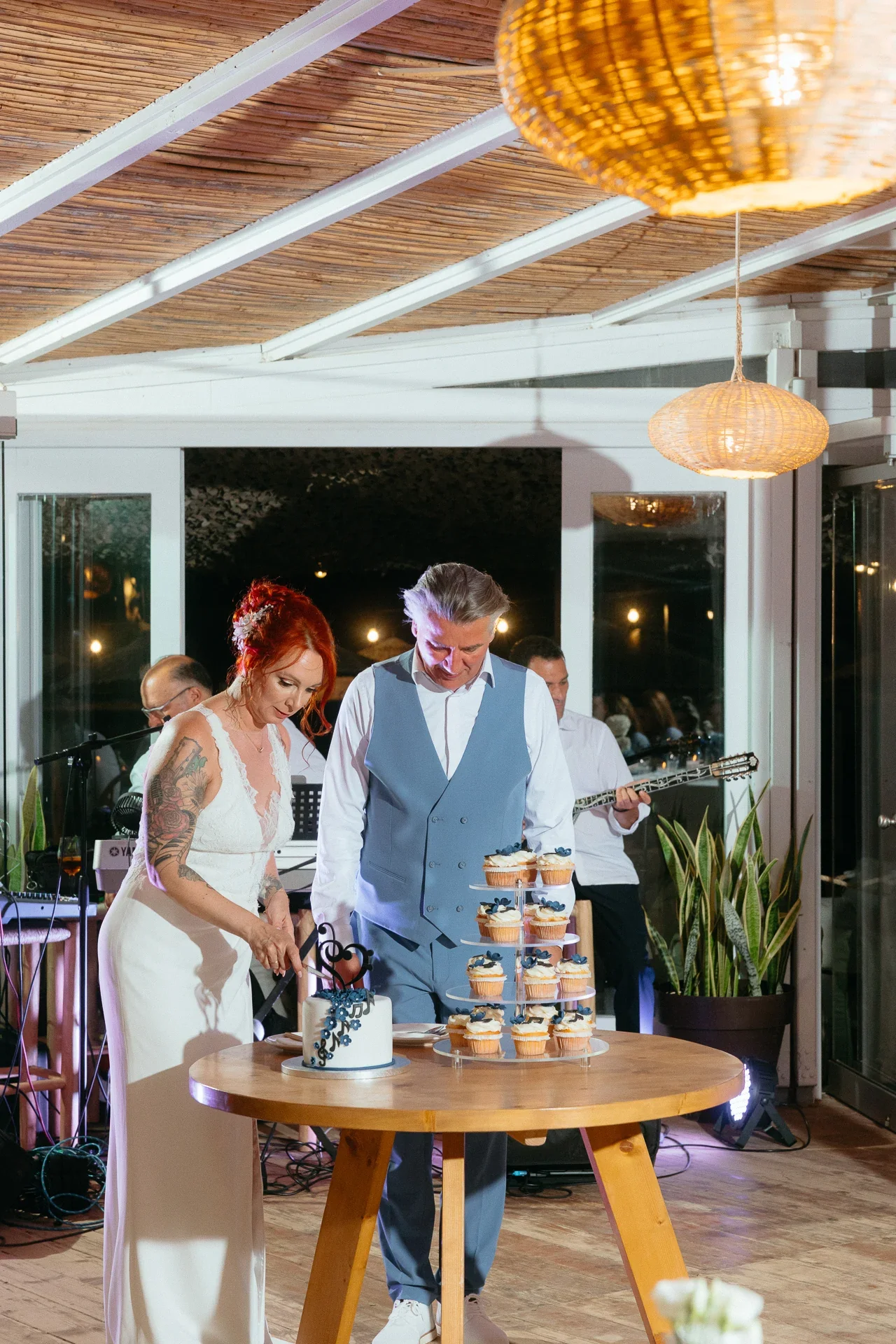 bride-and-groom-cutting-wedding-cake.webp