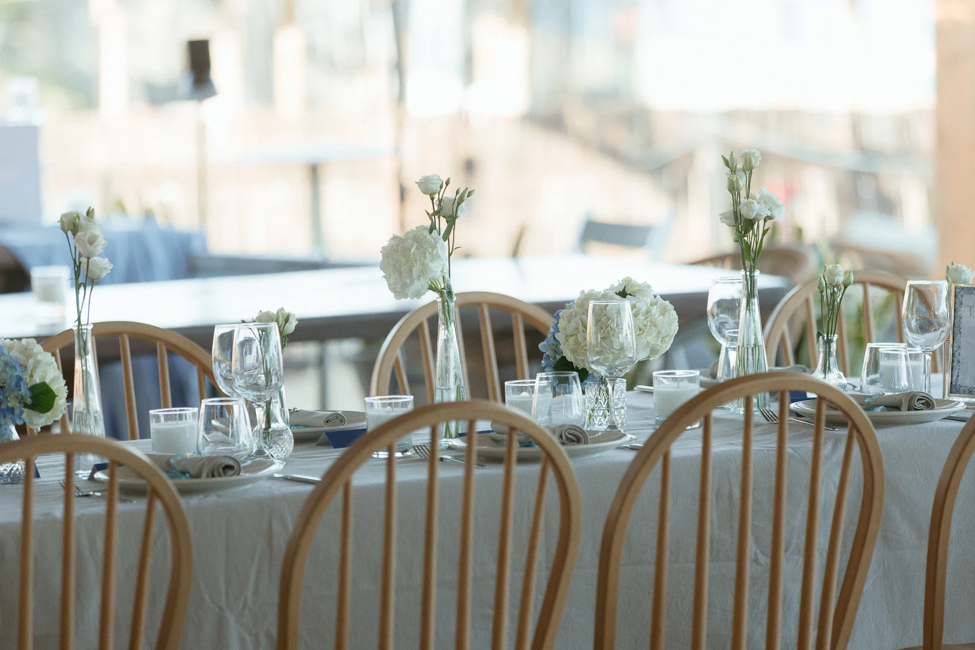 wedding-reception-table-by-the-sea.webp