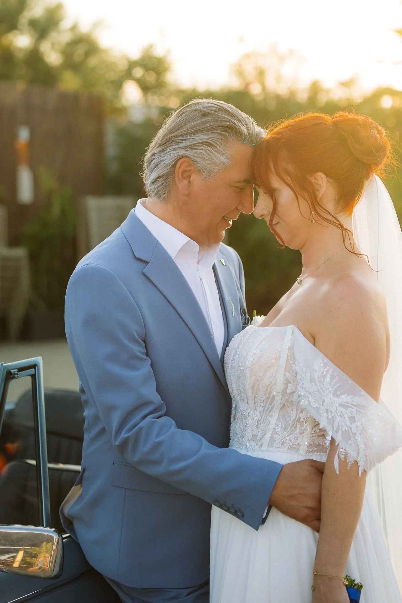 bride-and-groom-in-sunset.webp