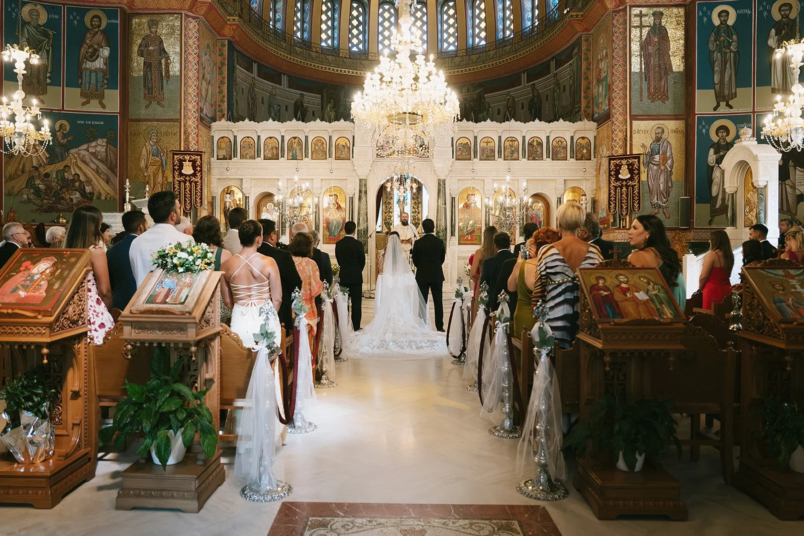 bride and groom getting married at an orthodox church