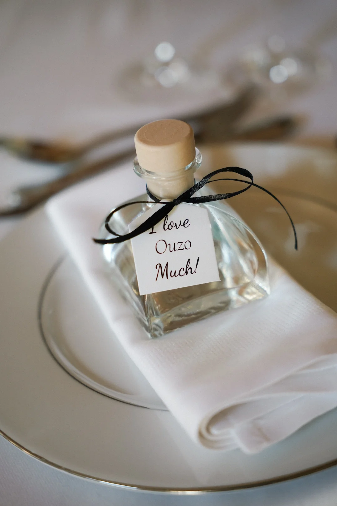 guests favors decorated with black bow