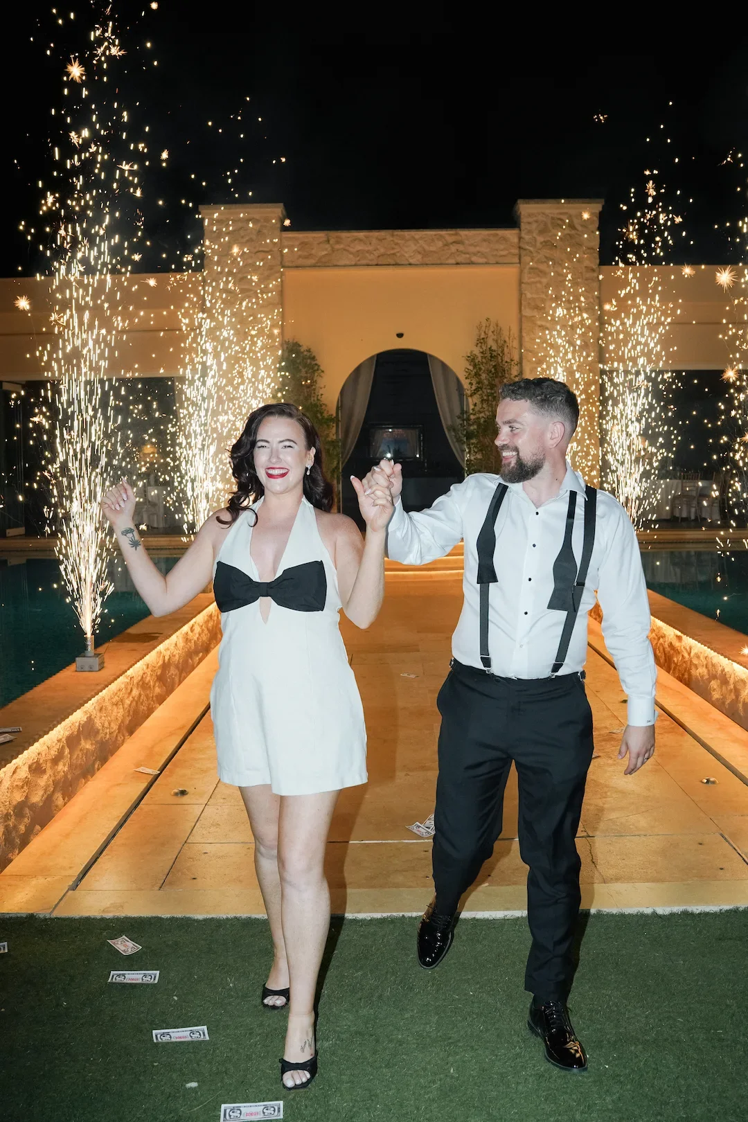 bride and groom heading to the dance floor