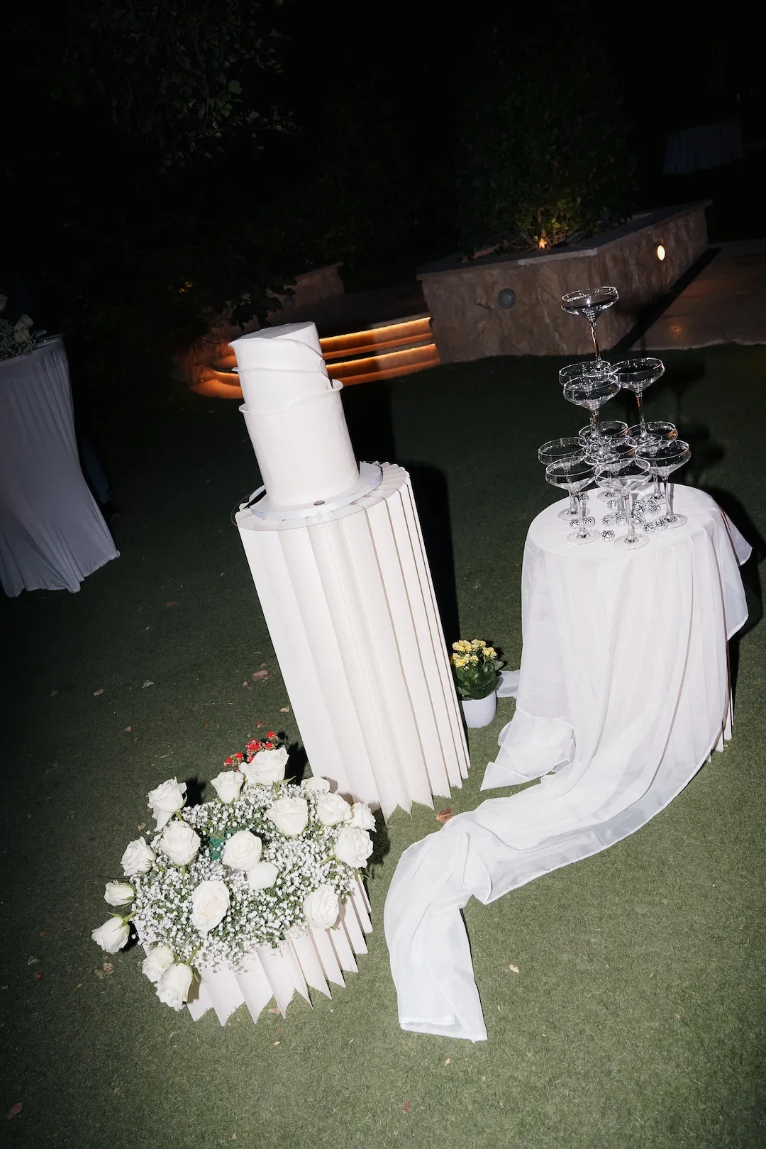 artistic set up for the cut of the wedding cake