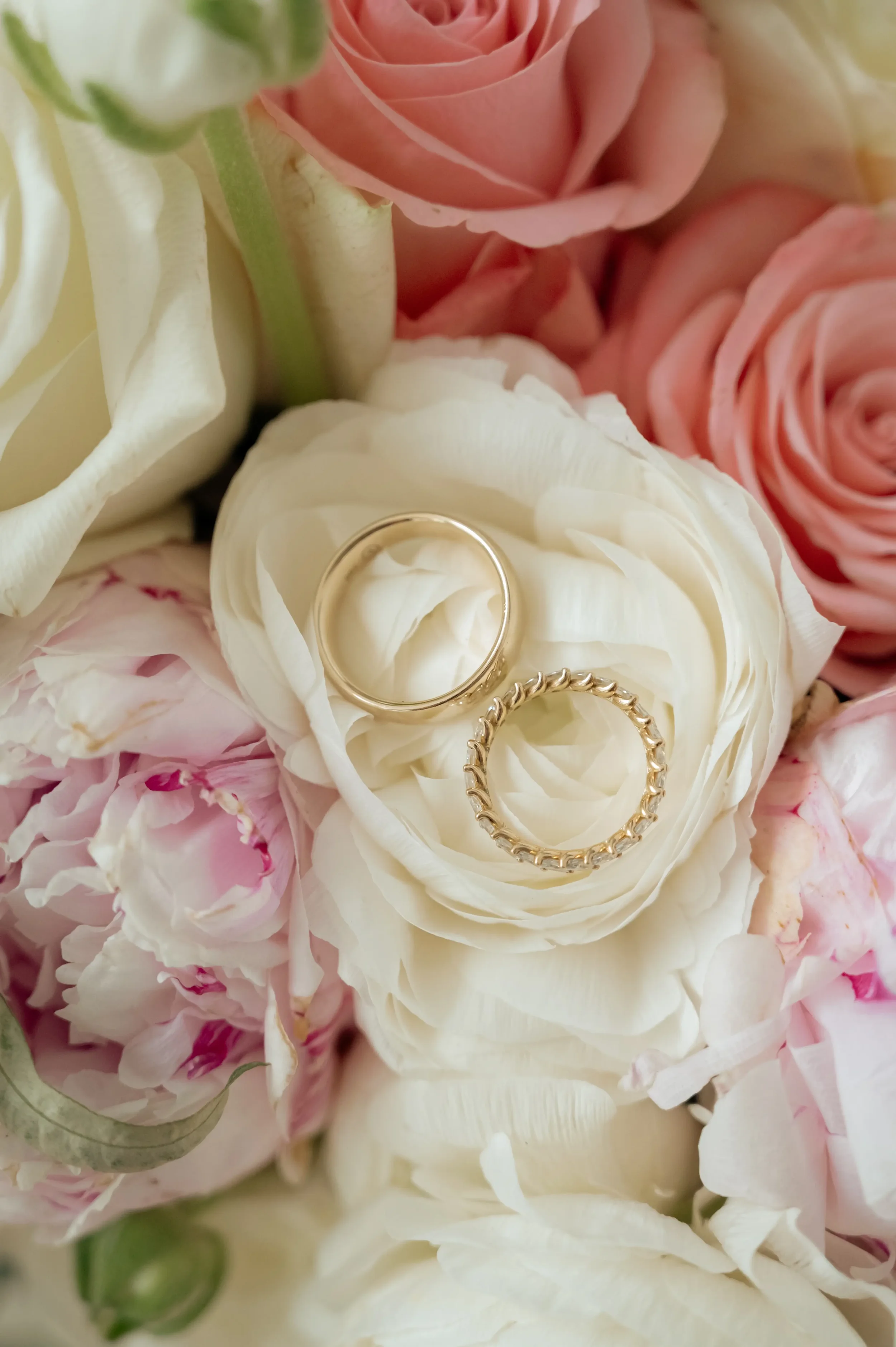 wedding-rings-inside-a-bouquet-of-flowers.webp