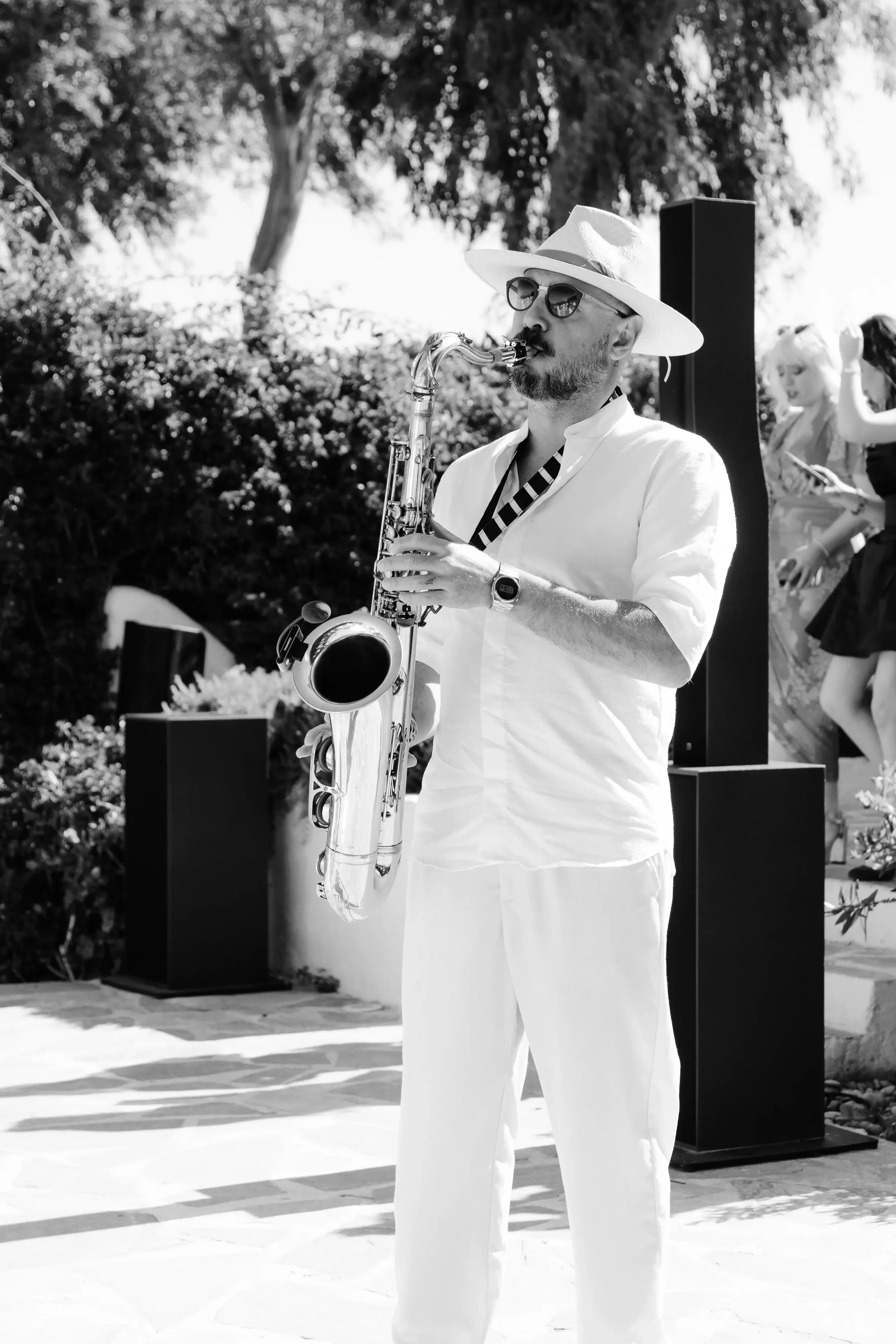 saxophone-player-during-the-cocktail-hour.webp