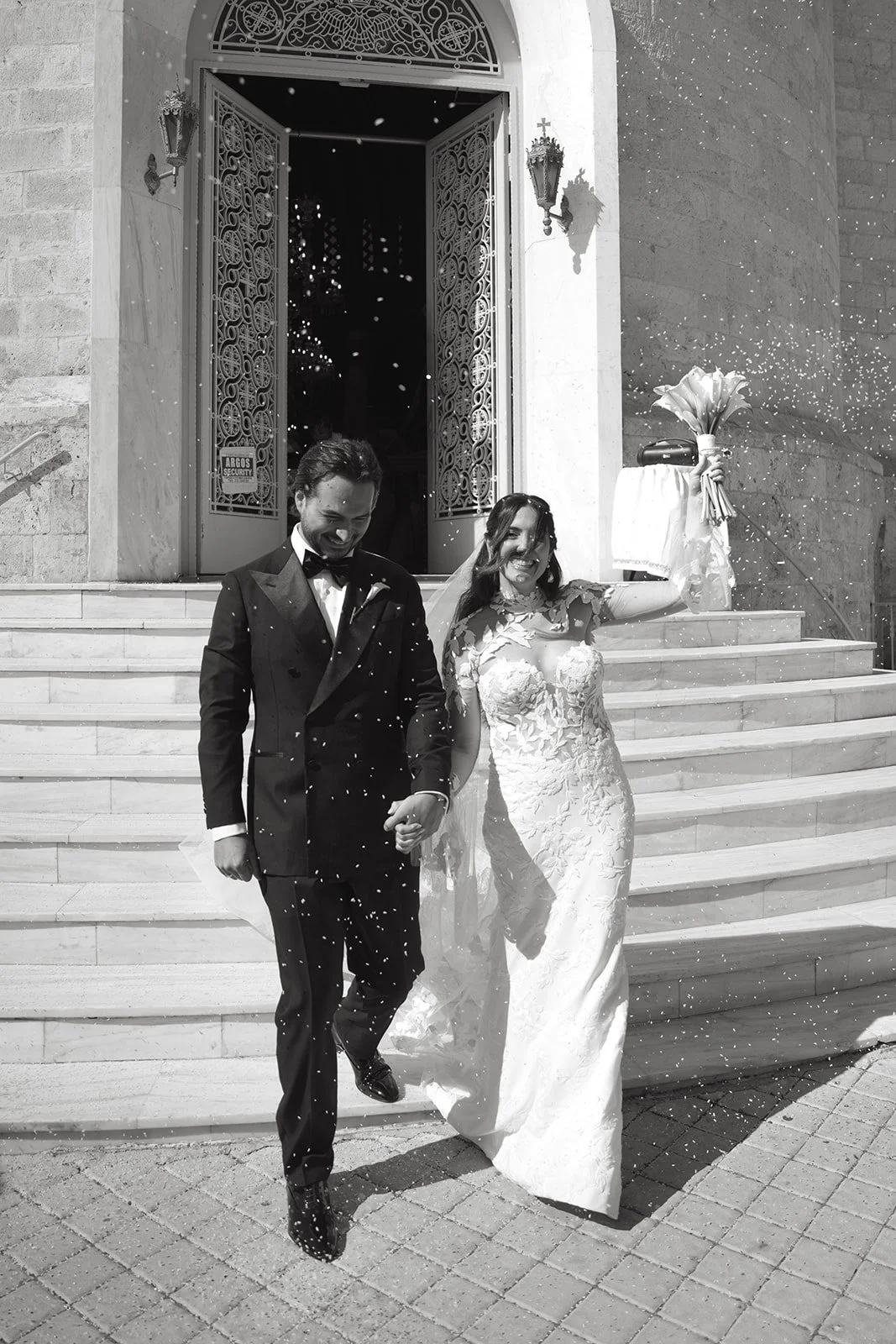 married couple walking out of the church