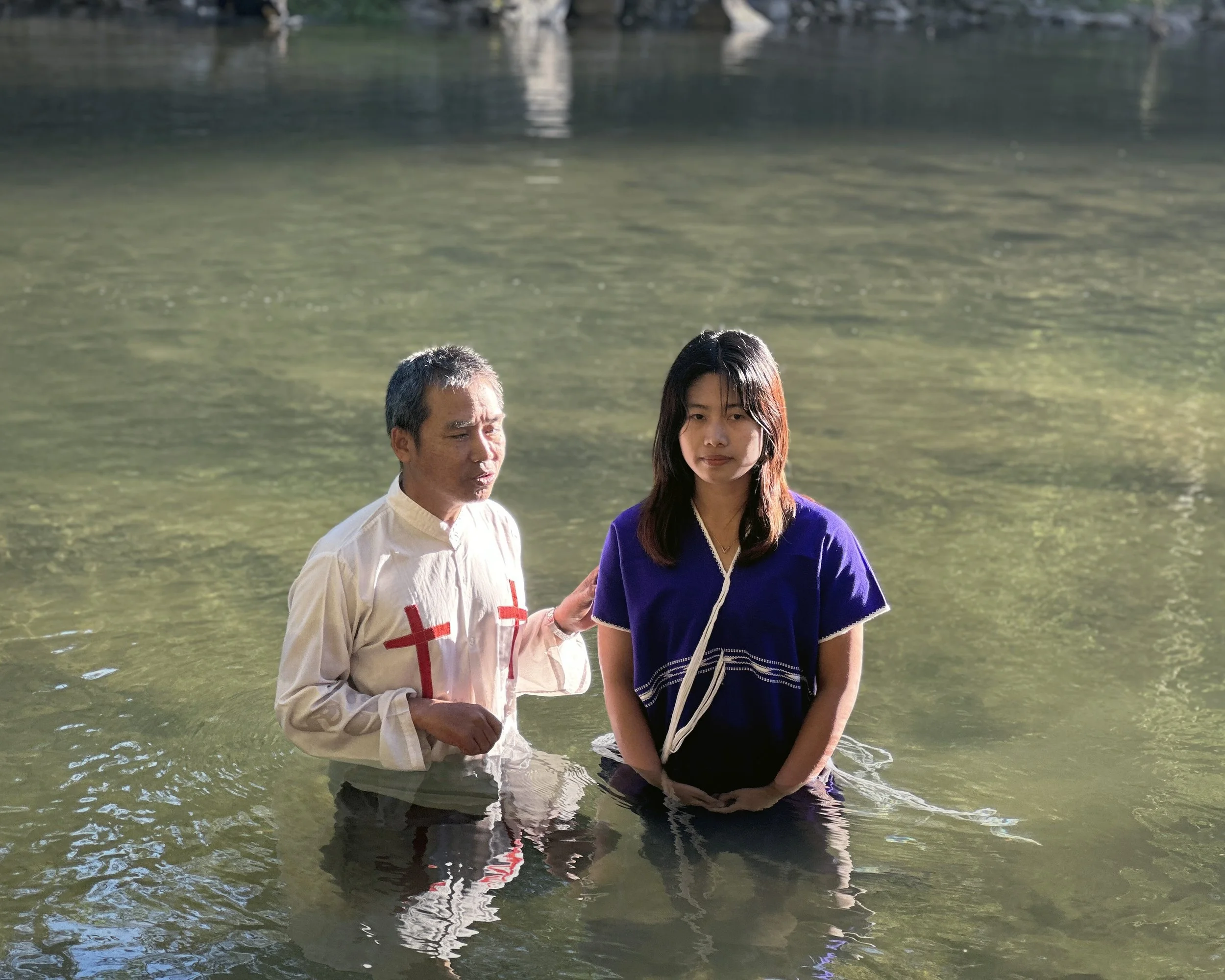 A student is baptized.