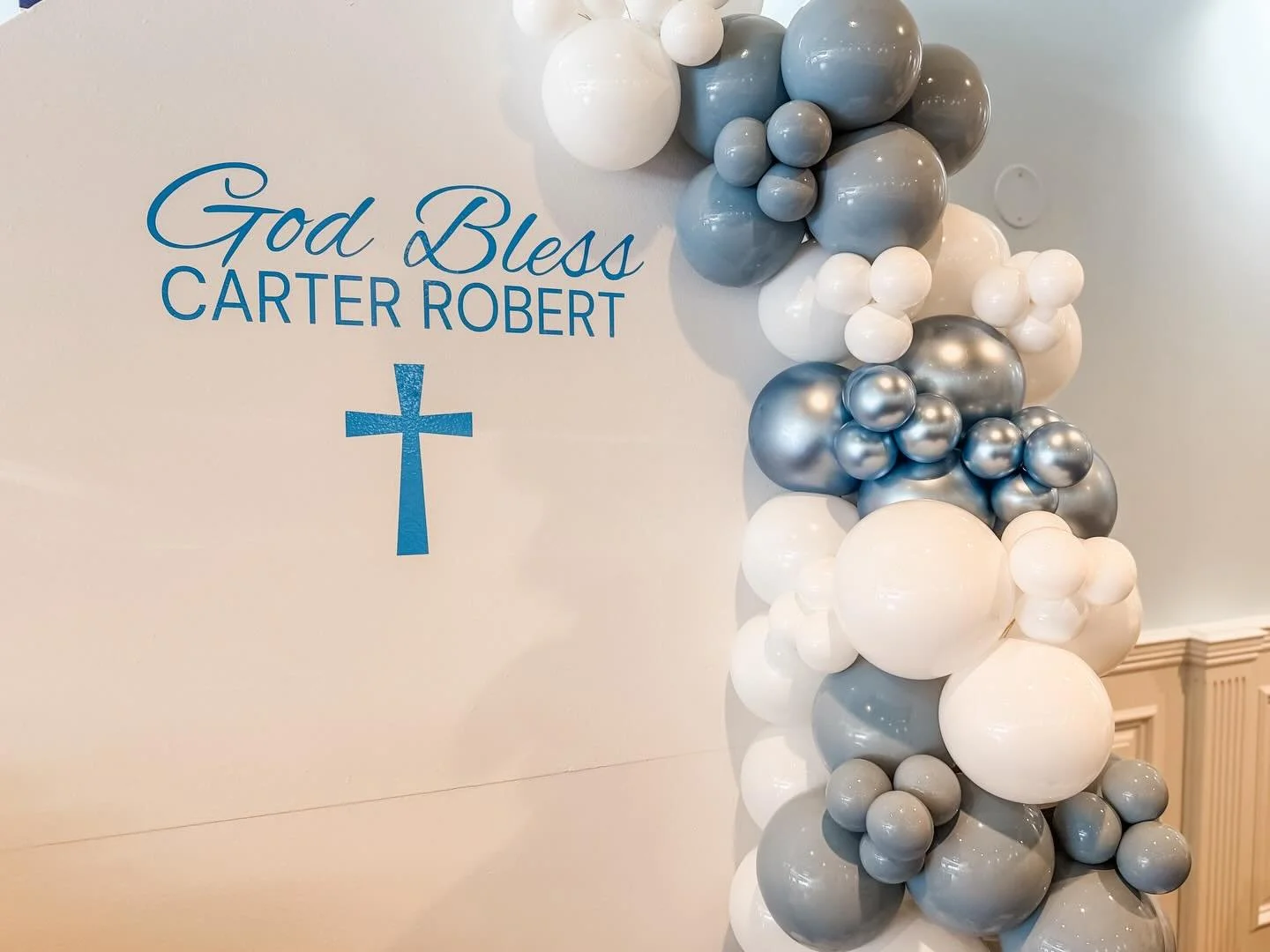 A closer look at Carter Robert&rsquo;s baptism setup 🩵🙏🏼
Soft blue, white, and chrome balloons paired with our custom backdrop for a classic and elegant celebration.

#njbaptism #baptismdecor #communionparty #ballooninstallation #njballoons