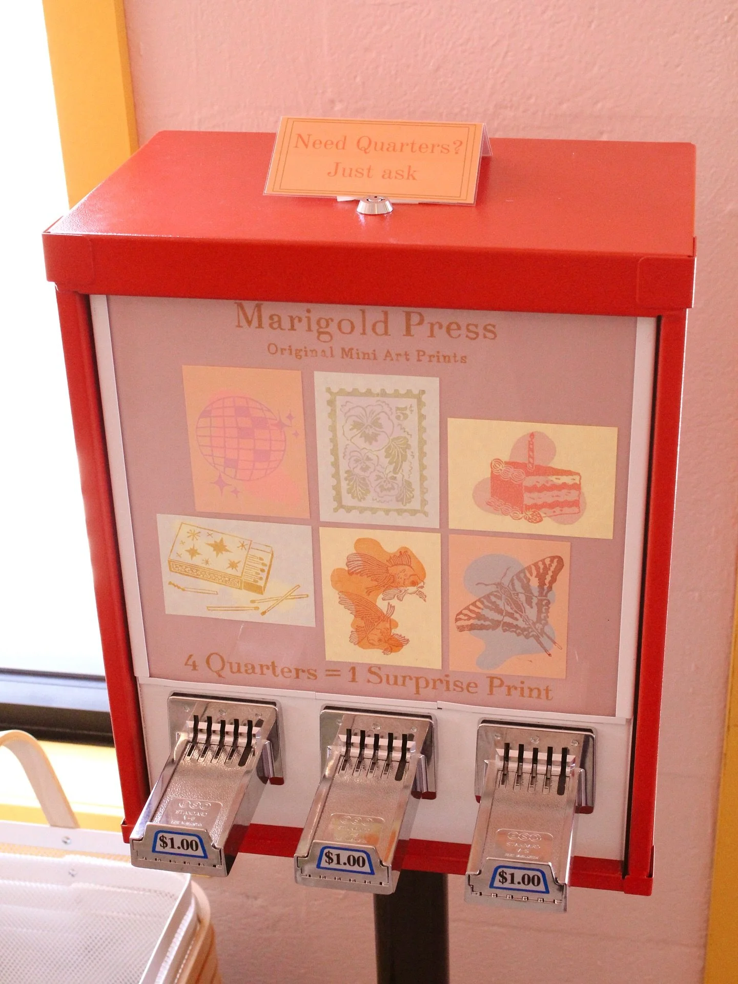 Want a tiny print when ya stop by? @marigold_press set up the cutest randomized print machine in our shop which 6 different design options! She even made us a cake for @bakedon8th and a disco ball for us! Come bring your quarters and see which one yo