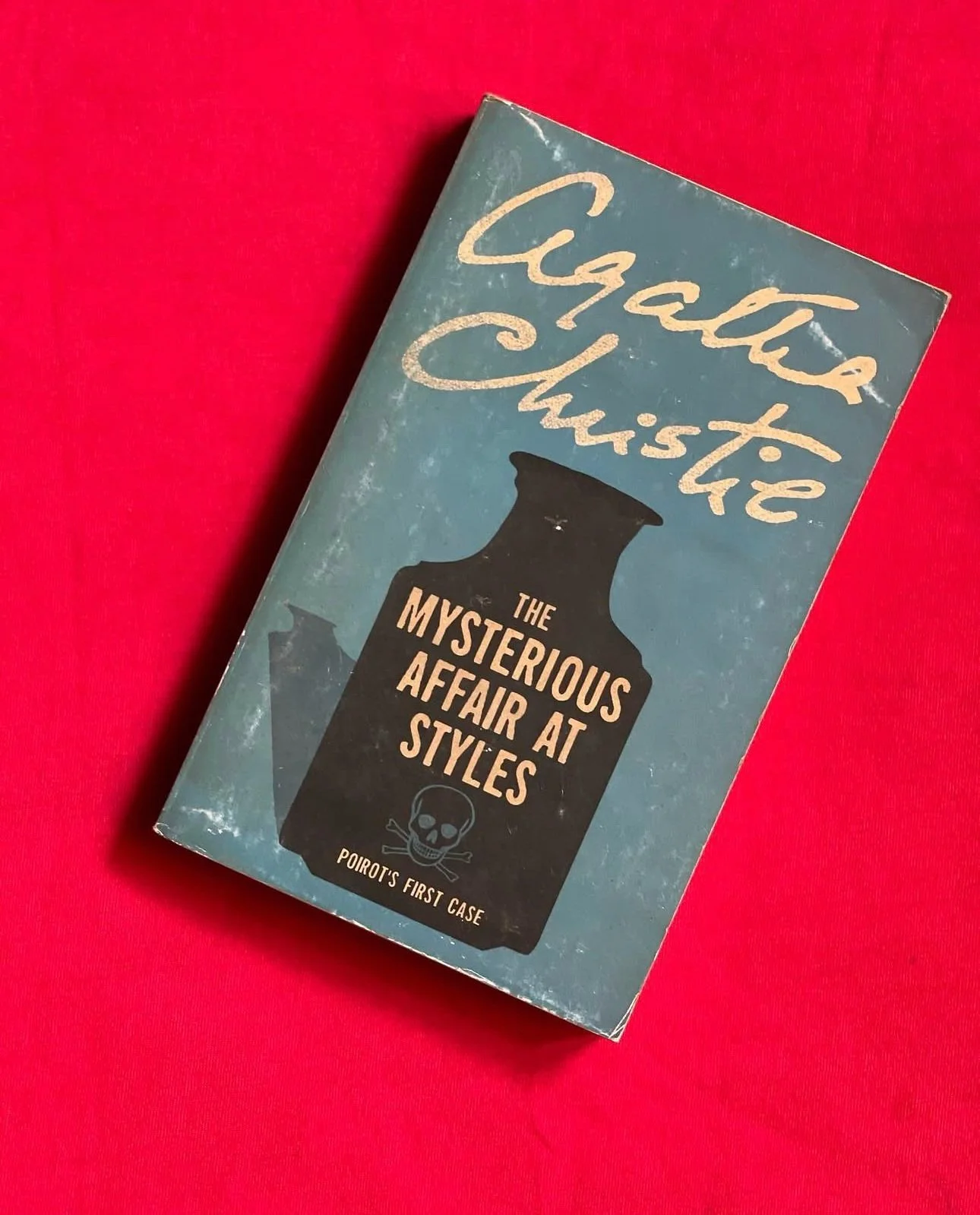 Agatha Christie, The Mysterious Affair at Styles (1921).
:
There has been a murder in the household of Styles Court. It is the morning of 18 July when Emily Inglethorp was found poisoned with fatal strychnine. 

Mrs. Inglethorp keeps updating her wil