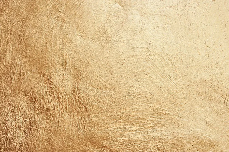 Close-up of a textured gold paper.