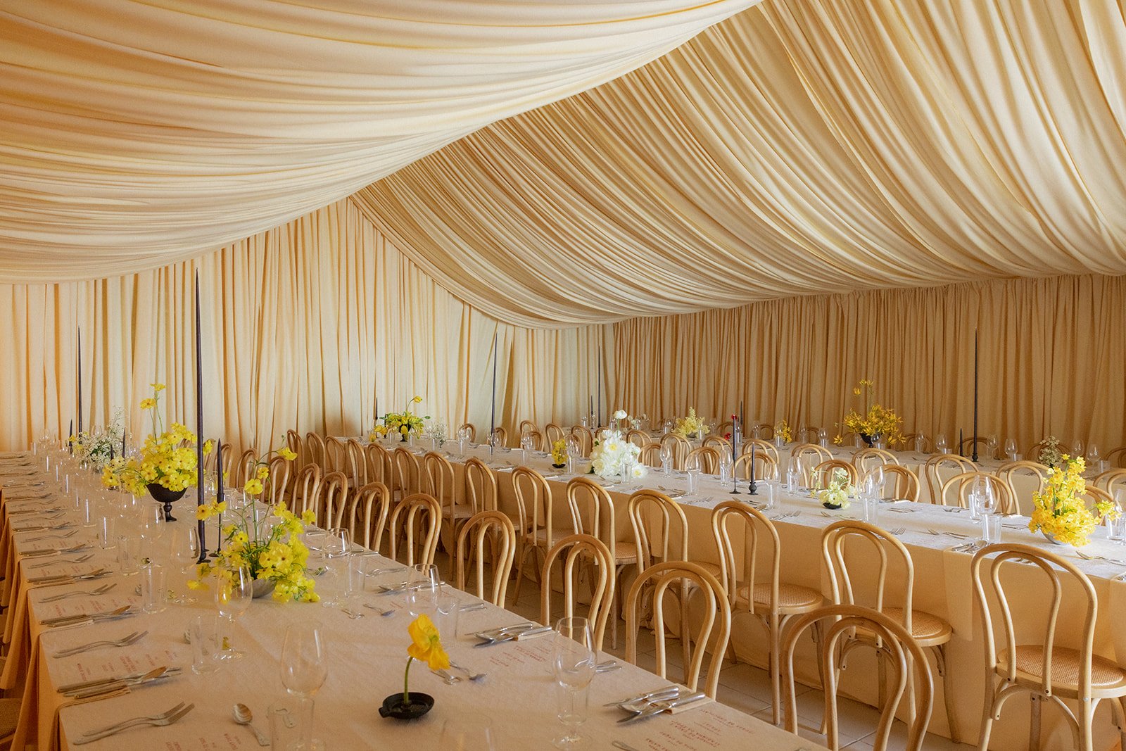yellow-flower-wedding-reception-draped-tent-artistic-destination-wedding-floral-design-oh-maria-flores-009.jpg