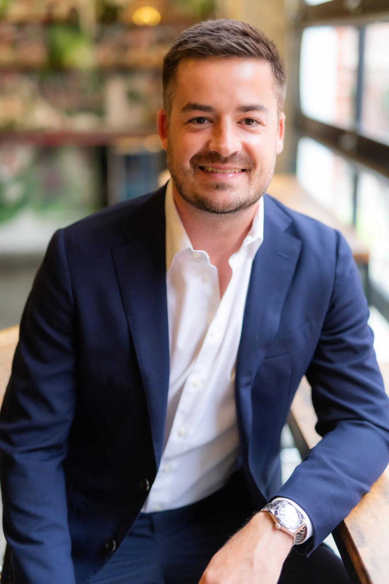headshot of a business man in a suit