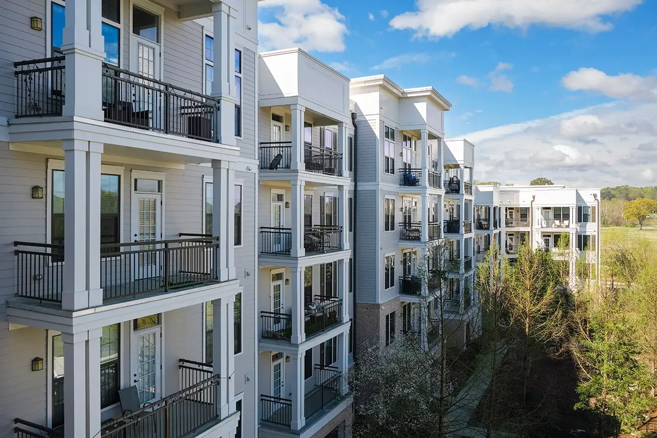 large-apartment-building-complex-GettyImages-2156129499-1300w-867h.webp